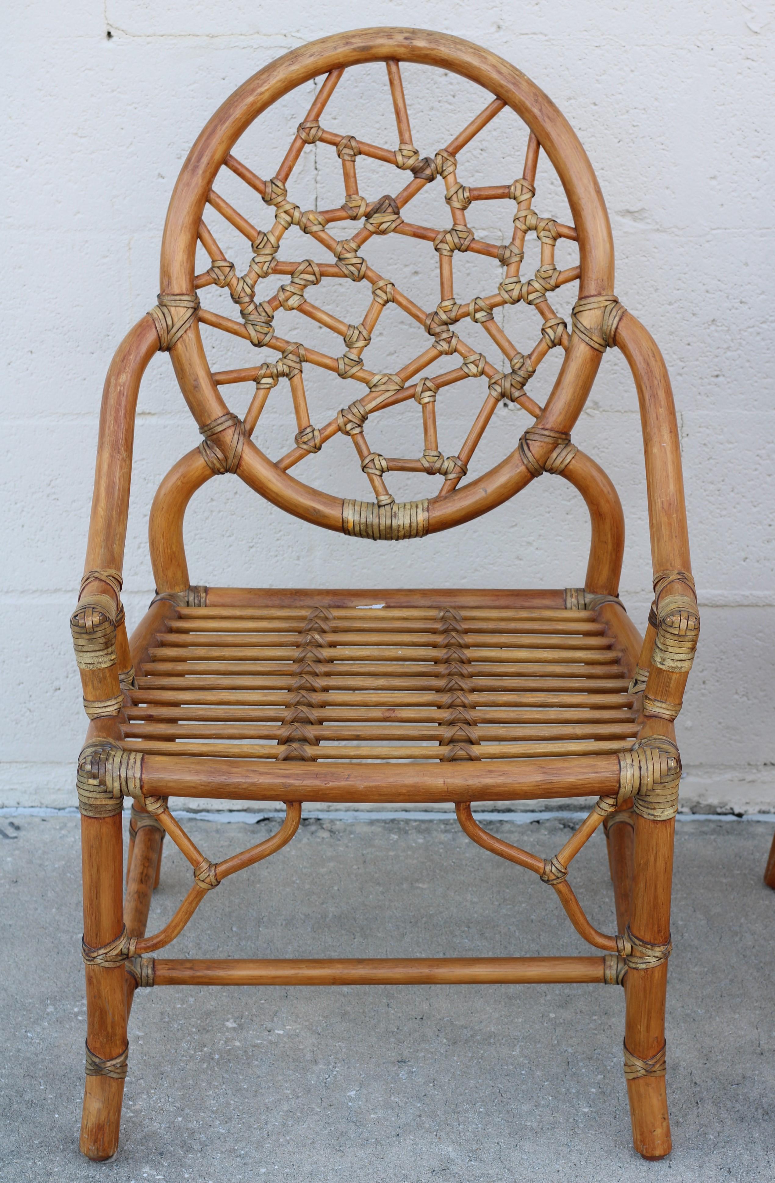 Pair of Rattan Cracked Ice Style Arm Chairs with Rolling Ottoman For Sale 1