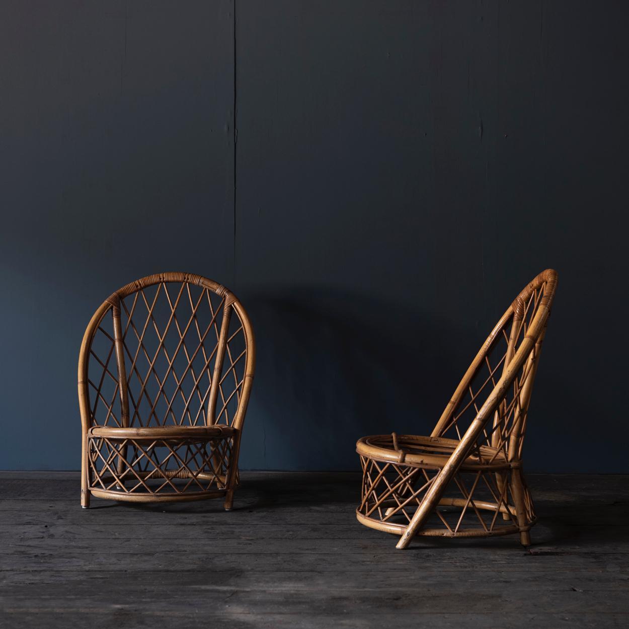 Mid-20th Century Set of Two Rattan Low Chairs and a Magazine Rack, Audoux Minet, 1960s, France