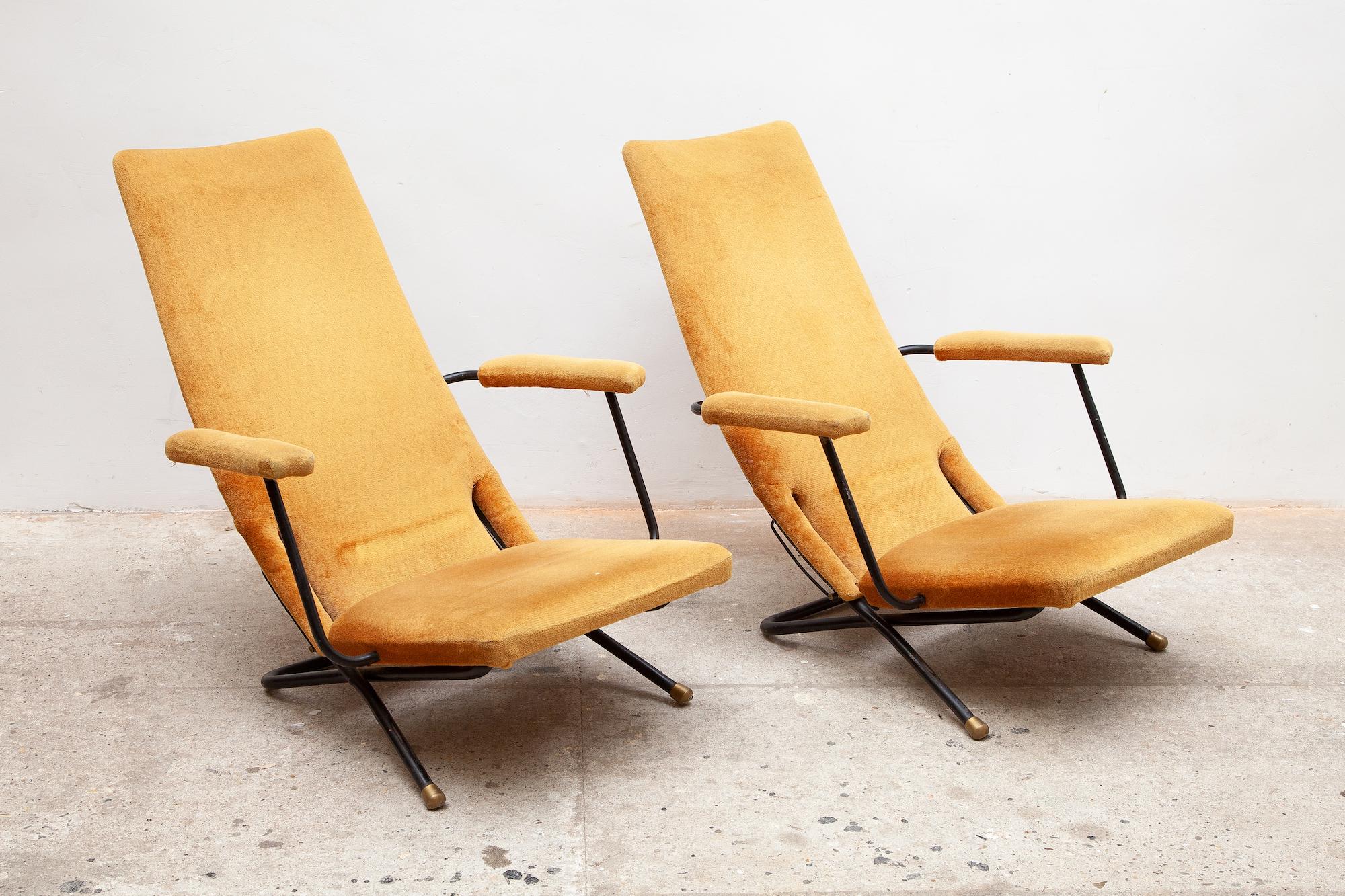 A pair of vintage midcentury lounge chairs. Tubular black frame and original velour yellow upholstery. Can be converted from an easy chair to a reclining seat in four positions. Recline mechanism works very well. Dimensions: 68 W x 102 H x 50 D cm.