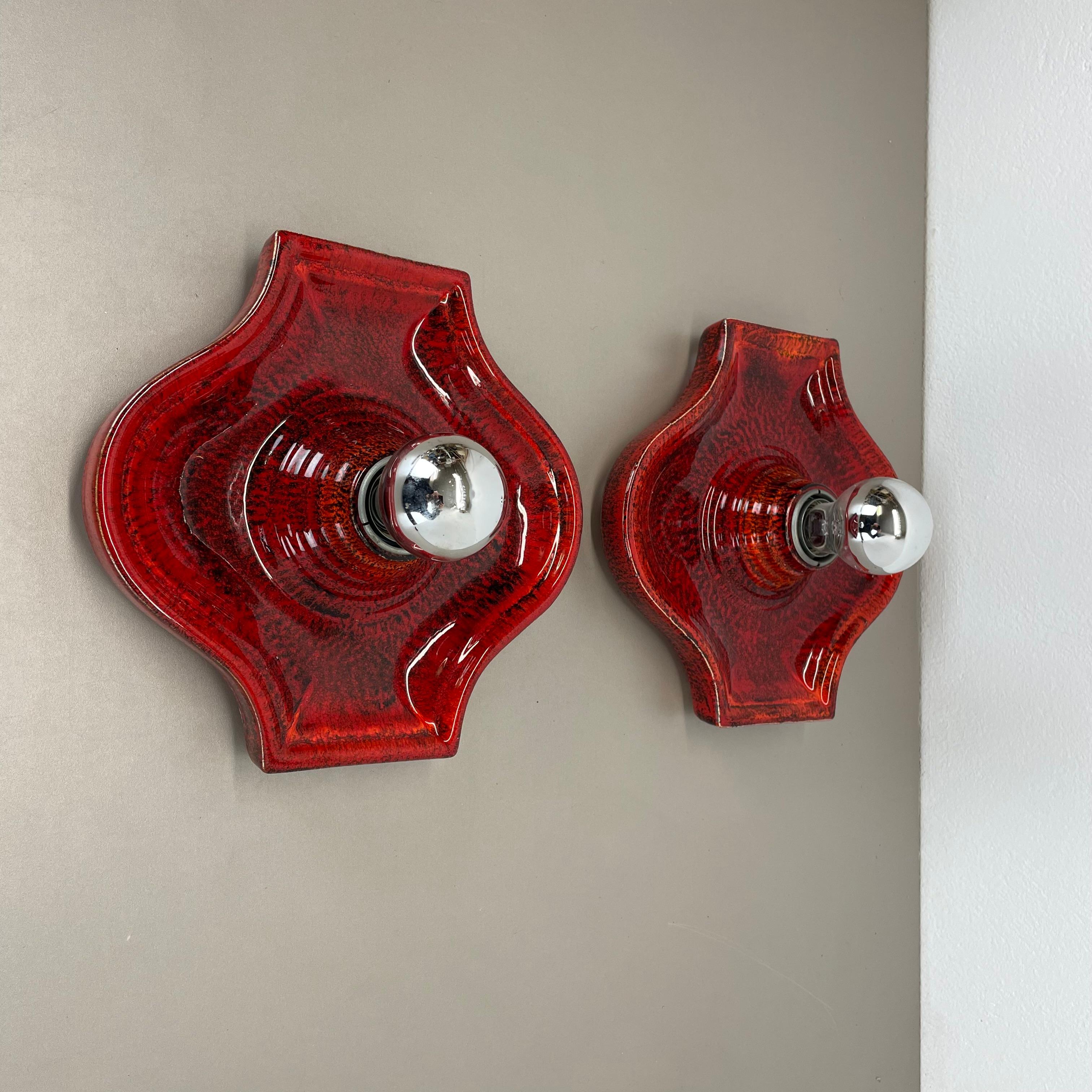 Article:

Wall light sconce set of two.


Producer:

Hustadt Lights, Germany.



Origin:

Germany.



Age:

1970s.



Description:

Original 1970s modernist German wall light made of ceramic in fat lava optic. This super rare set of two walls light