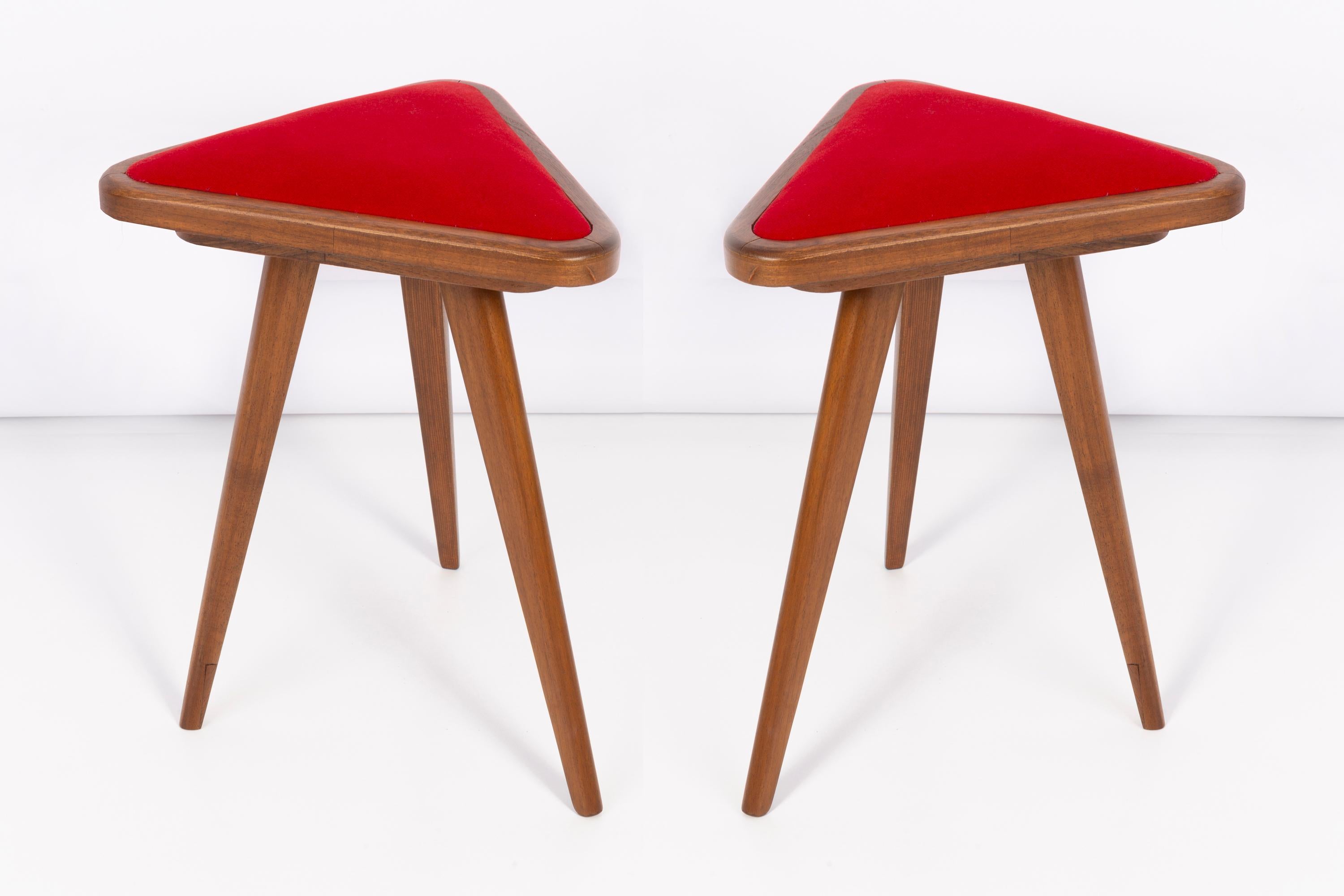 Stools from the turn of the 1960s and 1970s. Beautiful velour upholstery in red color. The stools consists of an upholstered part, a seat and wooden legs narrowing downwards, characteristic of the 1960s style. They are absolutely unique.

Any