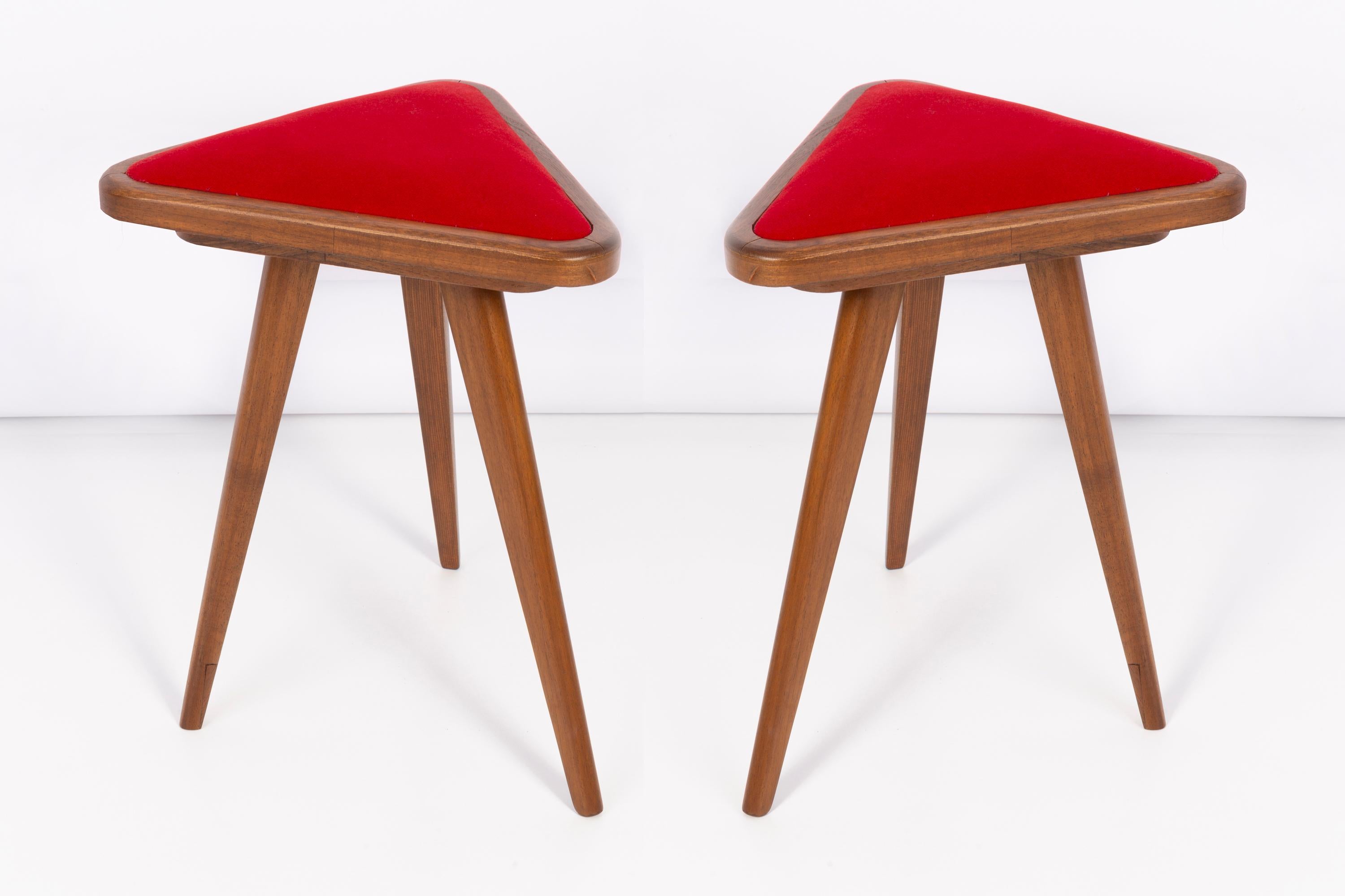 Stools from the turn of the 1960s and 1970s. Beautiful velour upholstery in red color. The stools consists of an upholstered part, a seat and wooden legs narrowing downwards, characteristic of the 1960s style. They are absolutely unique.

Any