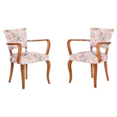 Ensemble de deux fauteuils Art Déco restaurés, par Jules Leleu, en hêtre, France, années 1930