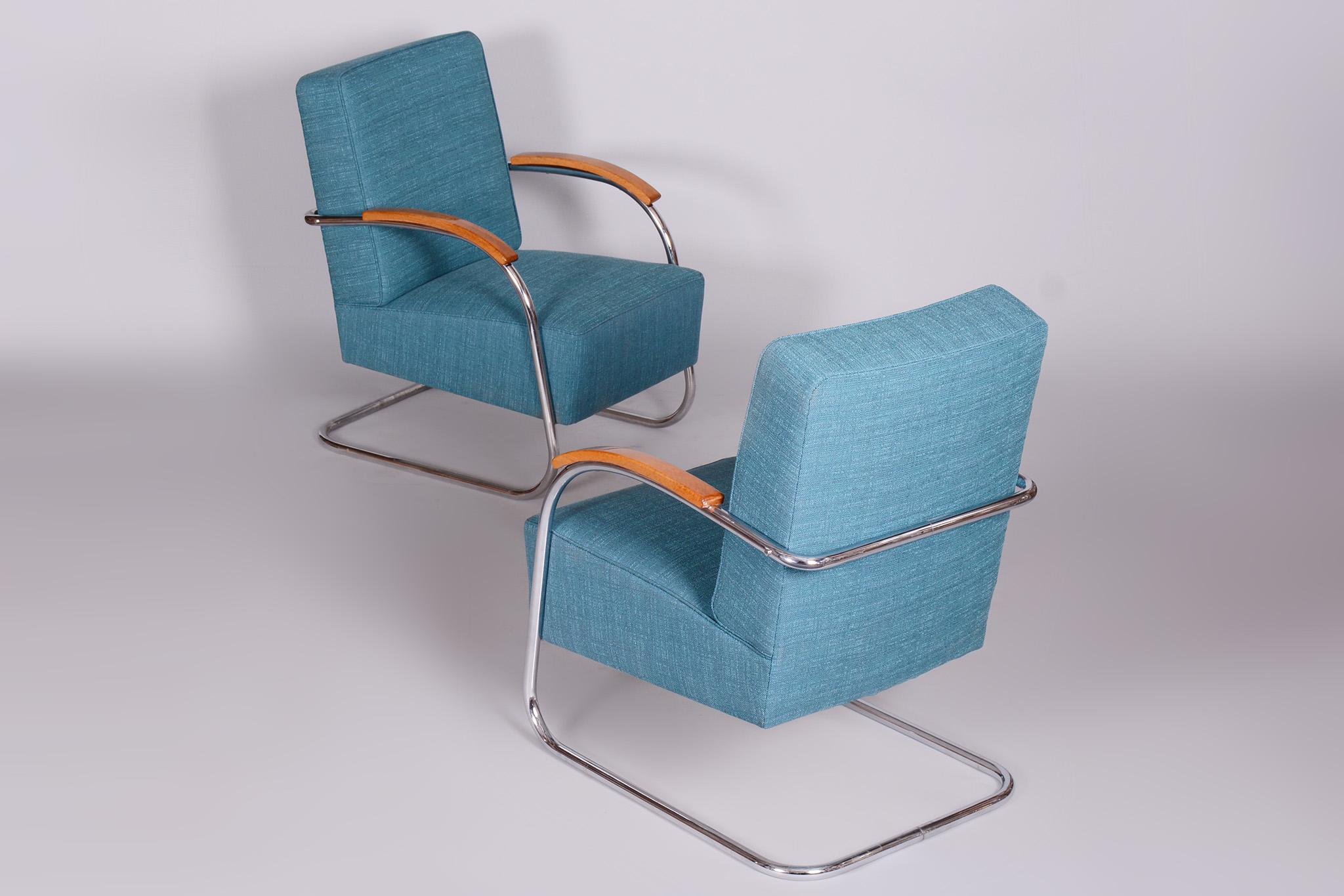 Set of two restored blue armchairs by Mucke-Melder.

Maker: Mucke-Melder
Period: 1930-1939
Source: Czechia
Material: Chrome-plated Steel, High-quality Retro Upholstery Fabric.

Our professional refurbishing team in Czechia has fully restored
