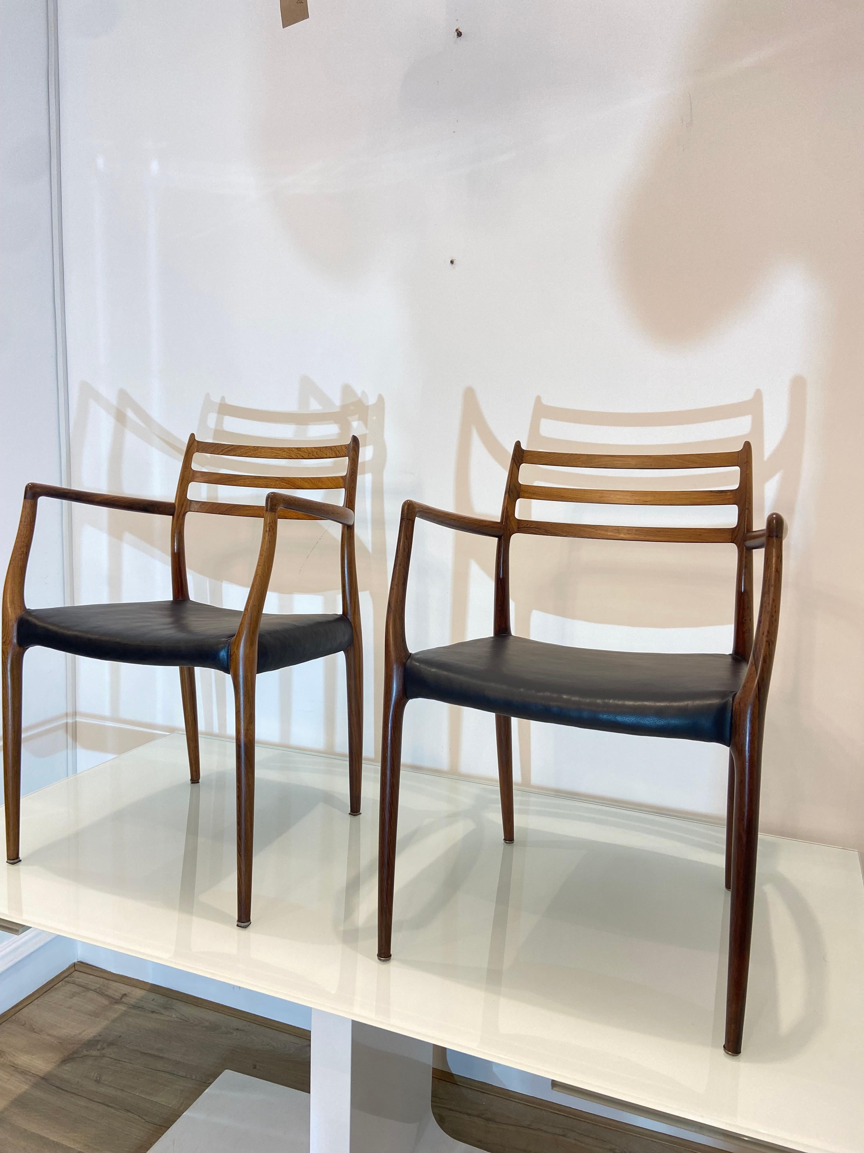 Danish Set Of Two Rosewood Niels Otto Moller Model 62 Dining Chairs In Black Leather For Sale