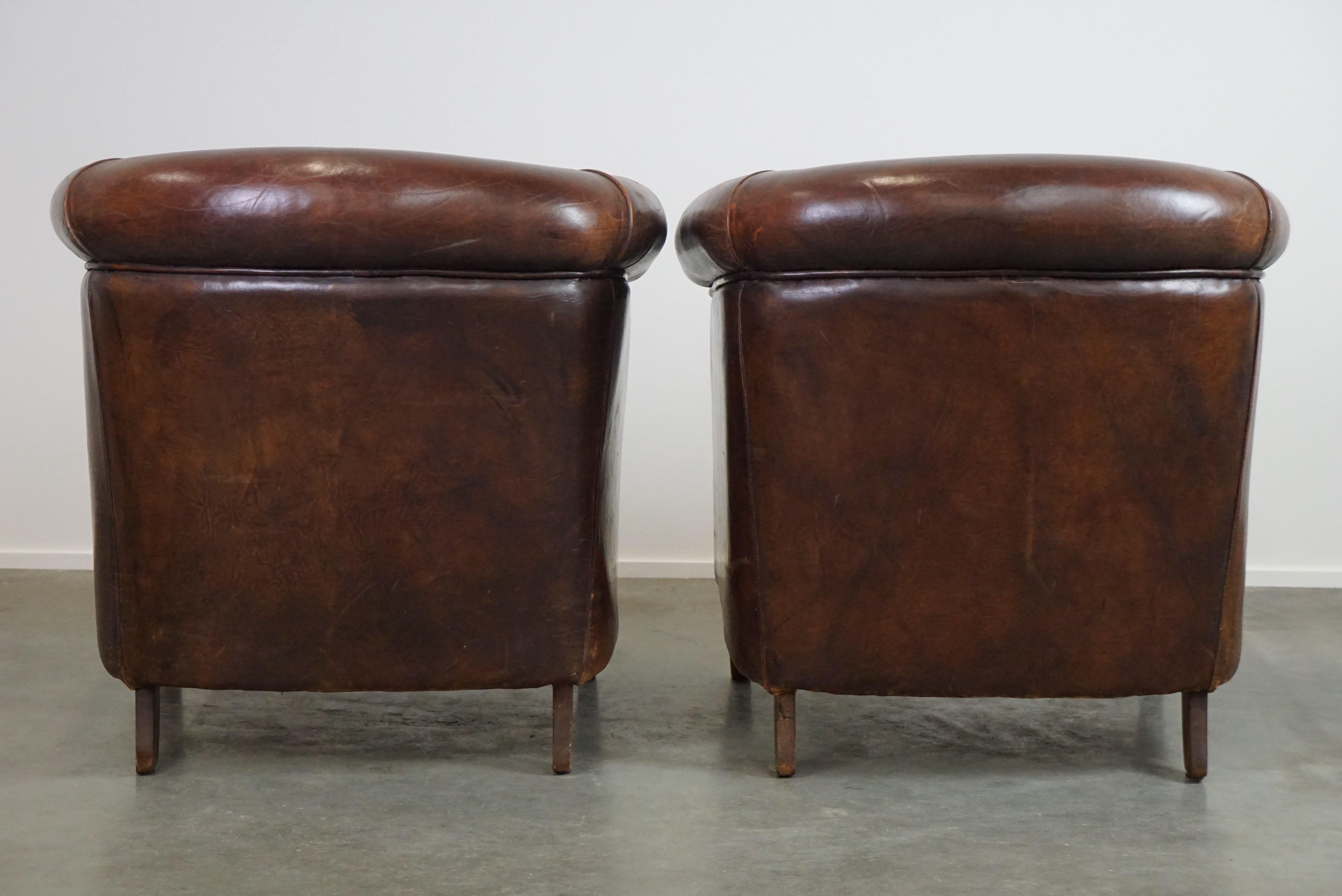 Hand-Crafted Set of two rugged sheep leather club armchairs with a beautifully worn look For Sale