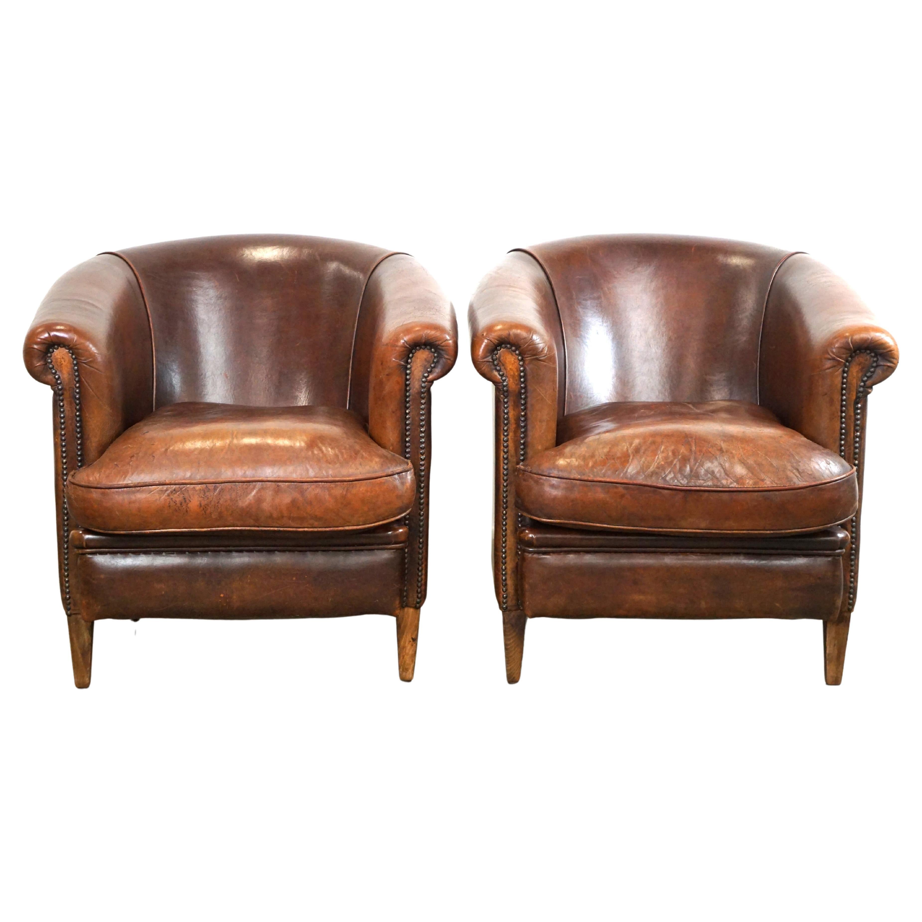 Gallery Detail: Set Of Two Rugged Sheep Leather Club Armchairs With A