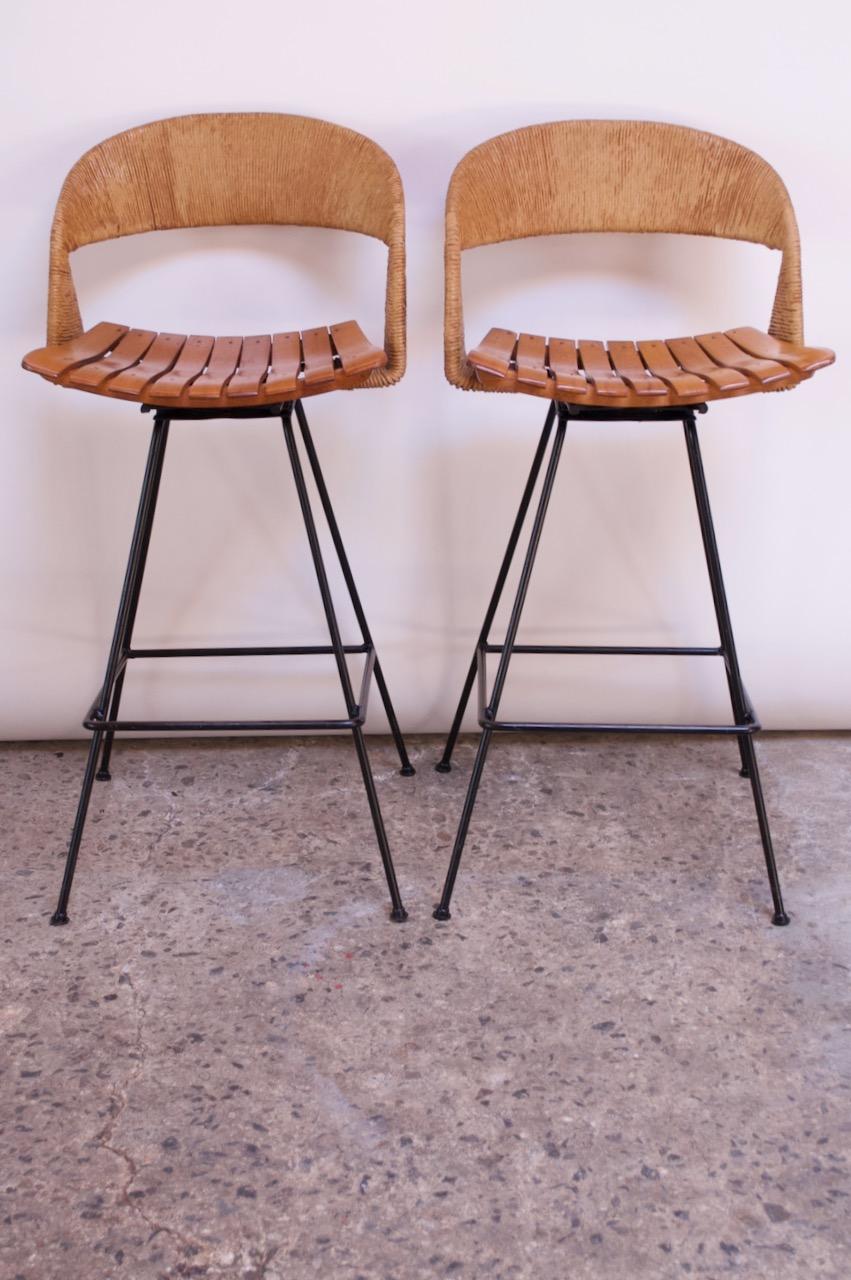Mid-Century Modern Set of Two Rush and Iron Swiveling Stools by Arthur Umanoff, Five Available