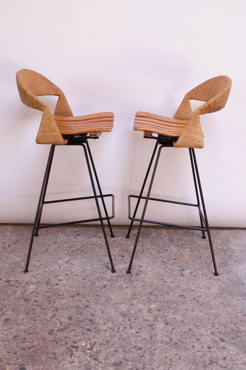 Set of Two Rush and Iron Swiveling Stools by Arthur Umanoff, Five Available In Good Condition In Brooklyn, NY