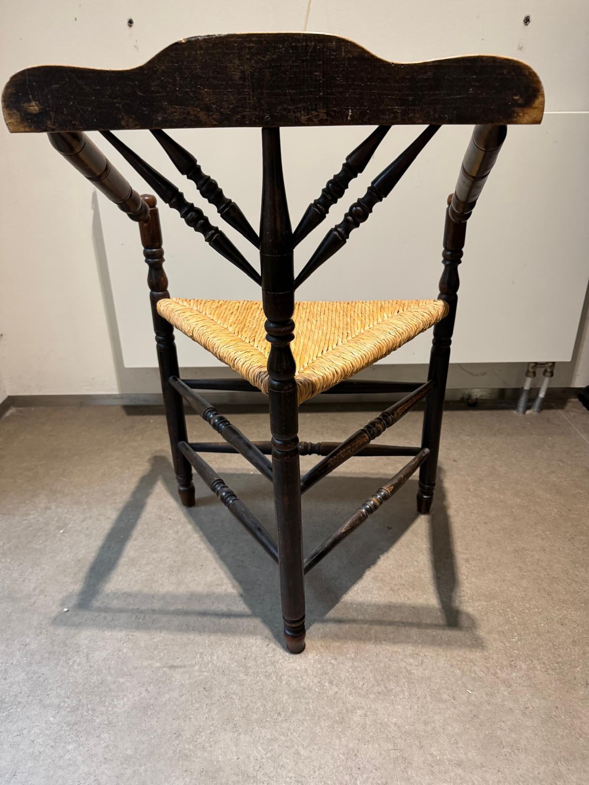 Late 19th century Edwardian style wooden armchair with rush seat

Set of two A lovely three-legged antique knitting chair from The Netherlands.
The knitting chair is an antique, robust chair with turned legs.
Seating is produced from rust.

 The