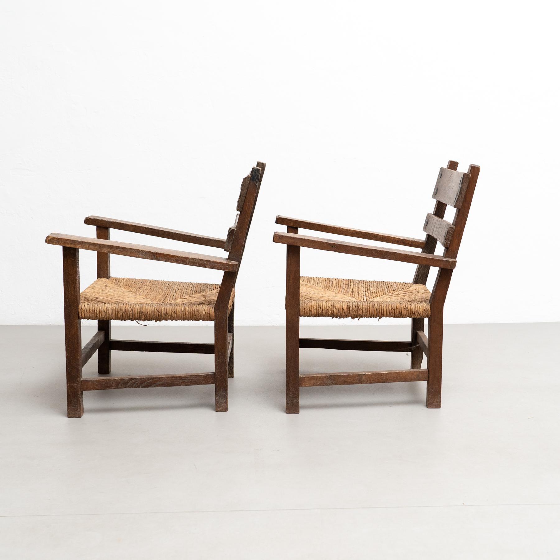 Set of Two Rustic Early 20th Century Armchairs in Solid Wood and Rattan In Good Condition For Sale In Barcelona, Barcelona