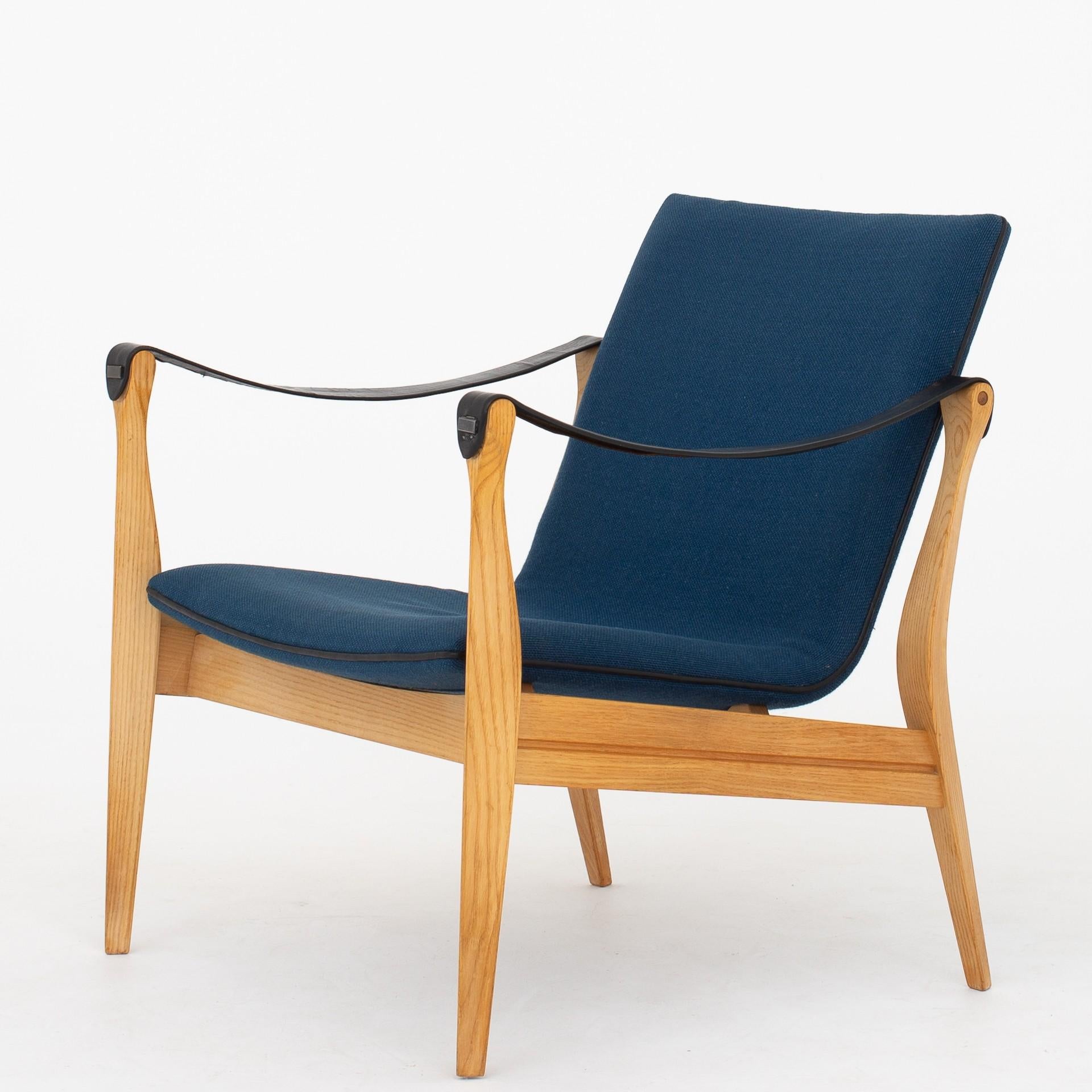 Set of two model 4305, Safari chairs in ash w. blue wool and black leather. Maker Fritz Hansen.