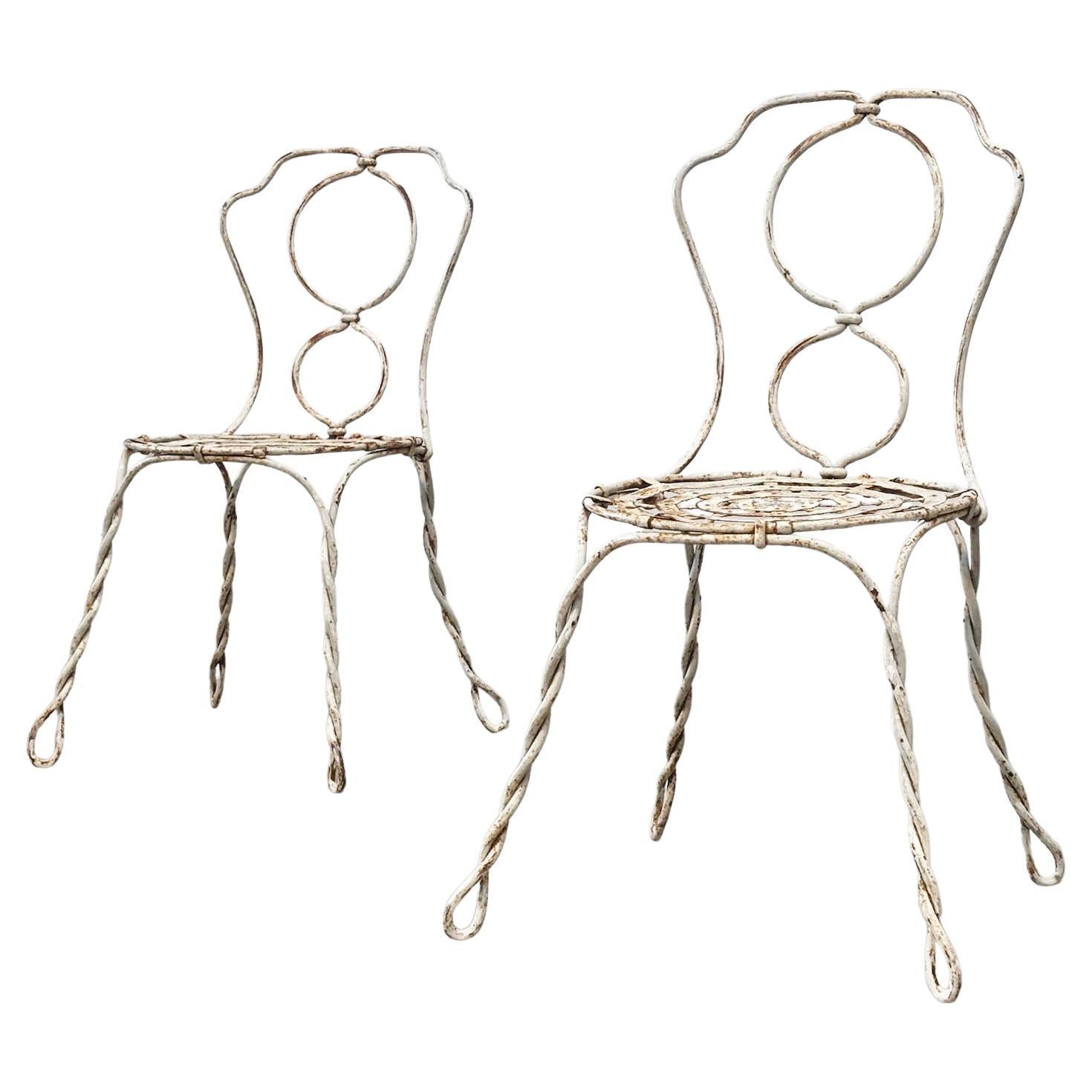 Ensemble de deux chaises de jardin françaises sculpturales