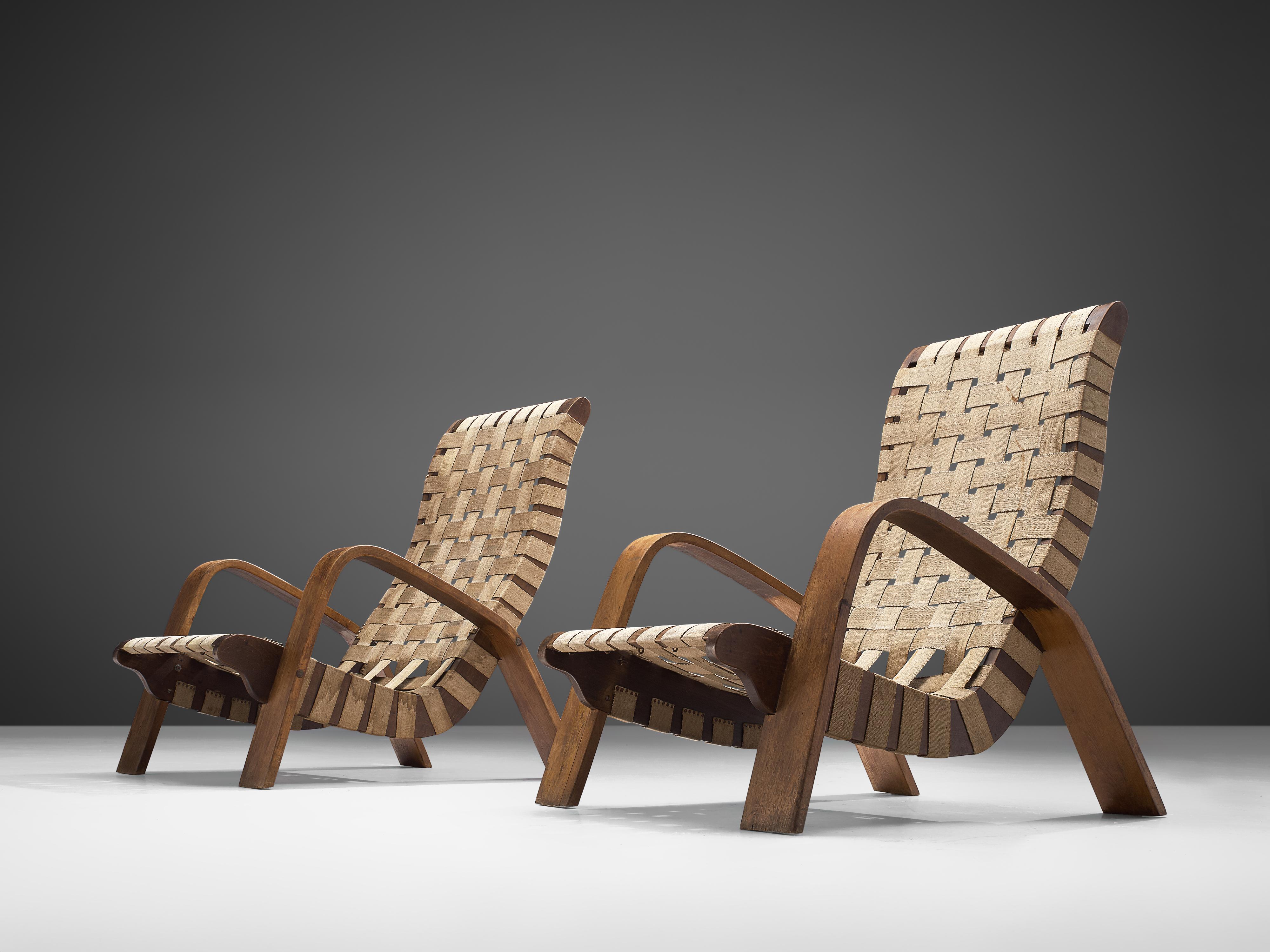 Mid-20th Century Set of Two Sculptural Lounge Chairs with Ottomans