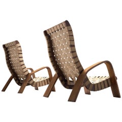 Set of Two Sculptural Lounge Chairs with Ottomans
