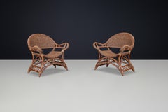 Set of Two Sculptural Rattan and Bamboo Lounge Chairs, Spain, 1960s