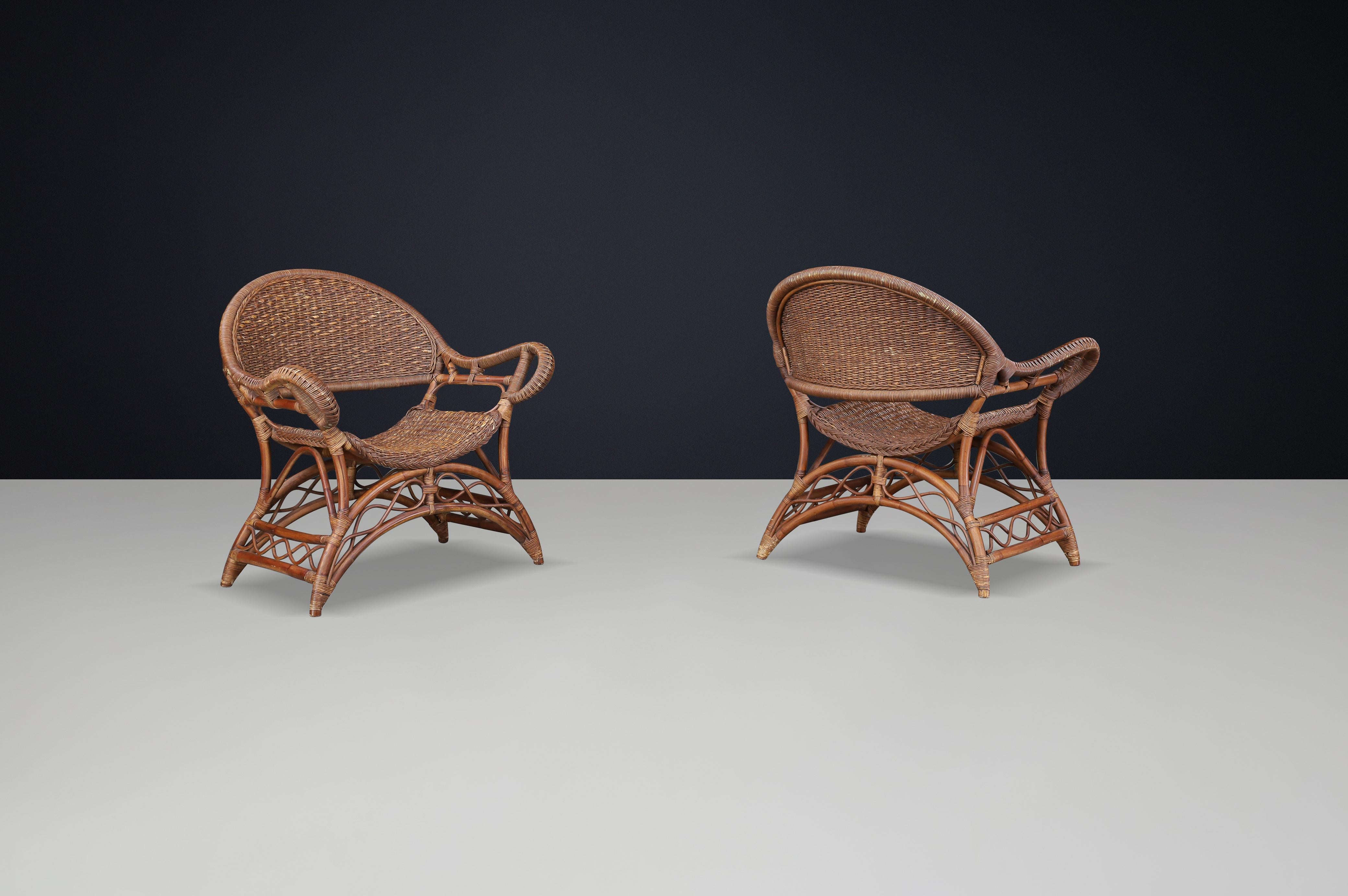 Mid-Century Modern Set of Two Sculptural Rattan and Bamboo Lounge Chairs, Spain, 1960s For Sale