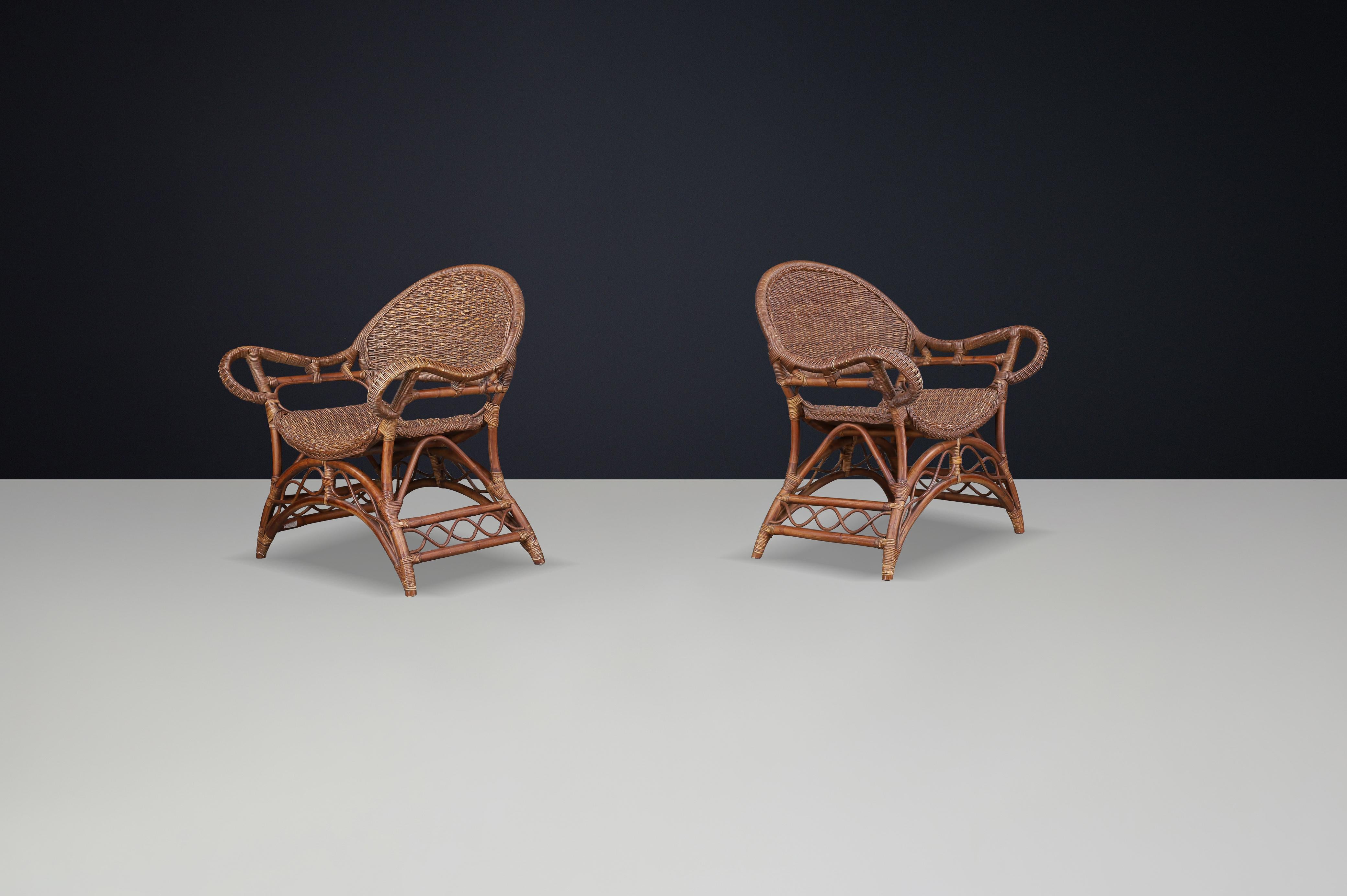 Spanish Set of Two Sculptural Rattan and Bamboo Lounge Chairs, Spain, 1960s For Sale
