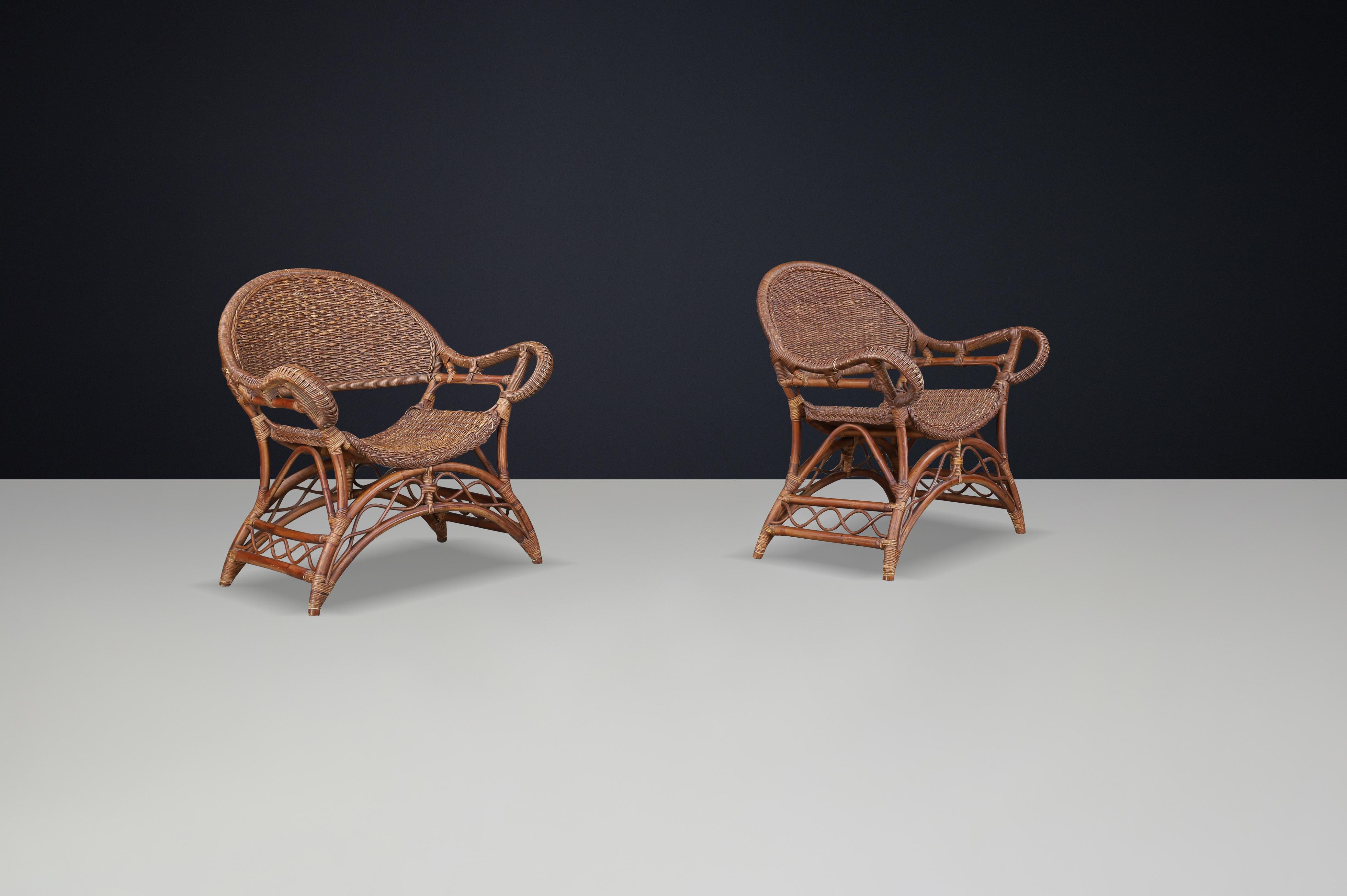 Set of Two Sculptural Rattan and Bamboo Lounge Chairs, Spain, 1960s In Good Condition For Sale In Almelo, NL