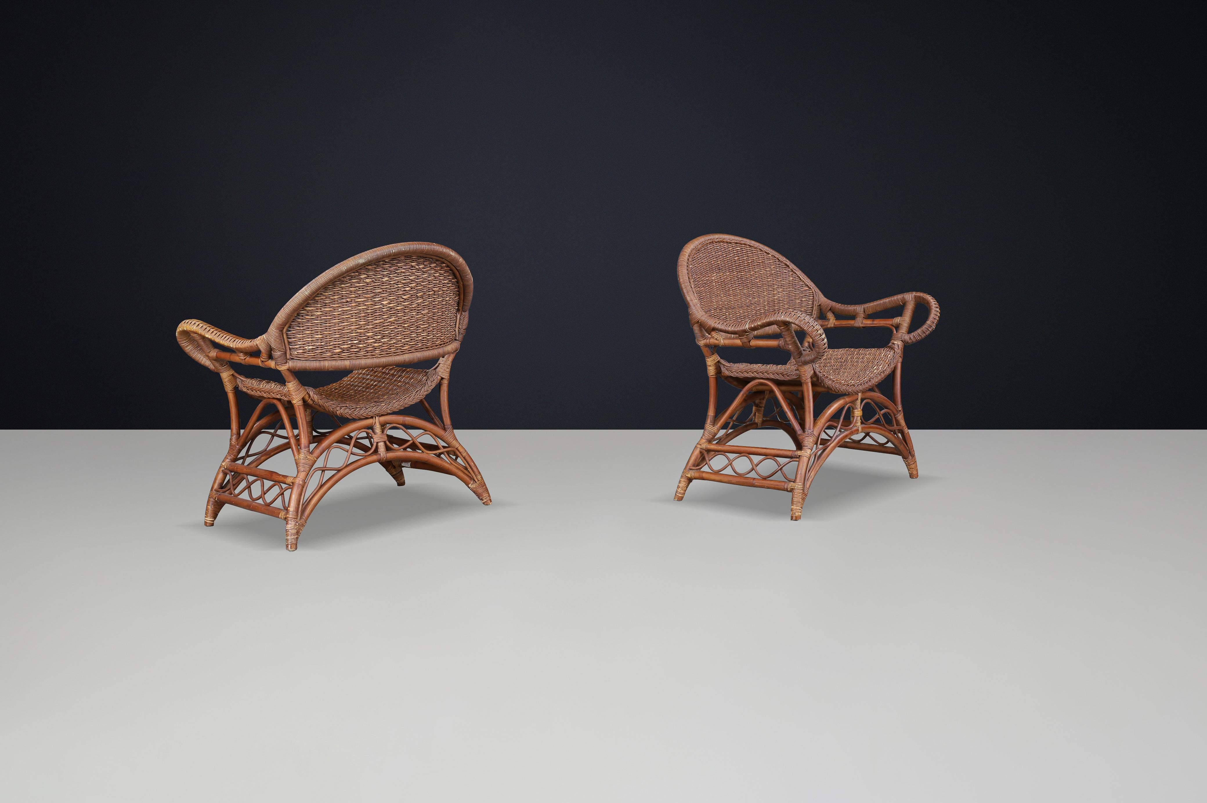20th Century Set of Two Sculptural Rattan and Bamboo Lounge Chairs, Spain, 1960s For Sale