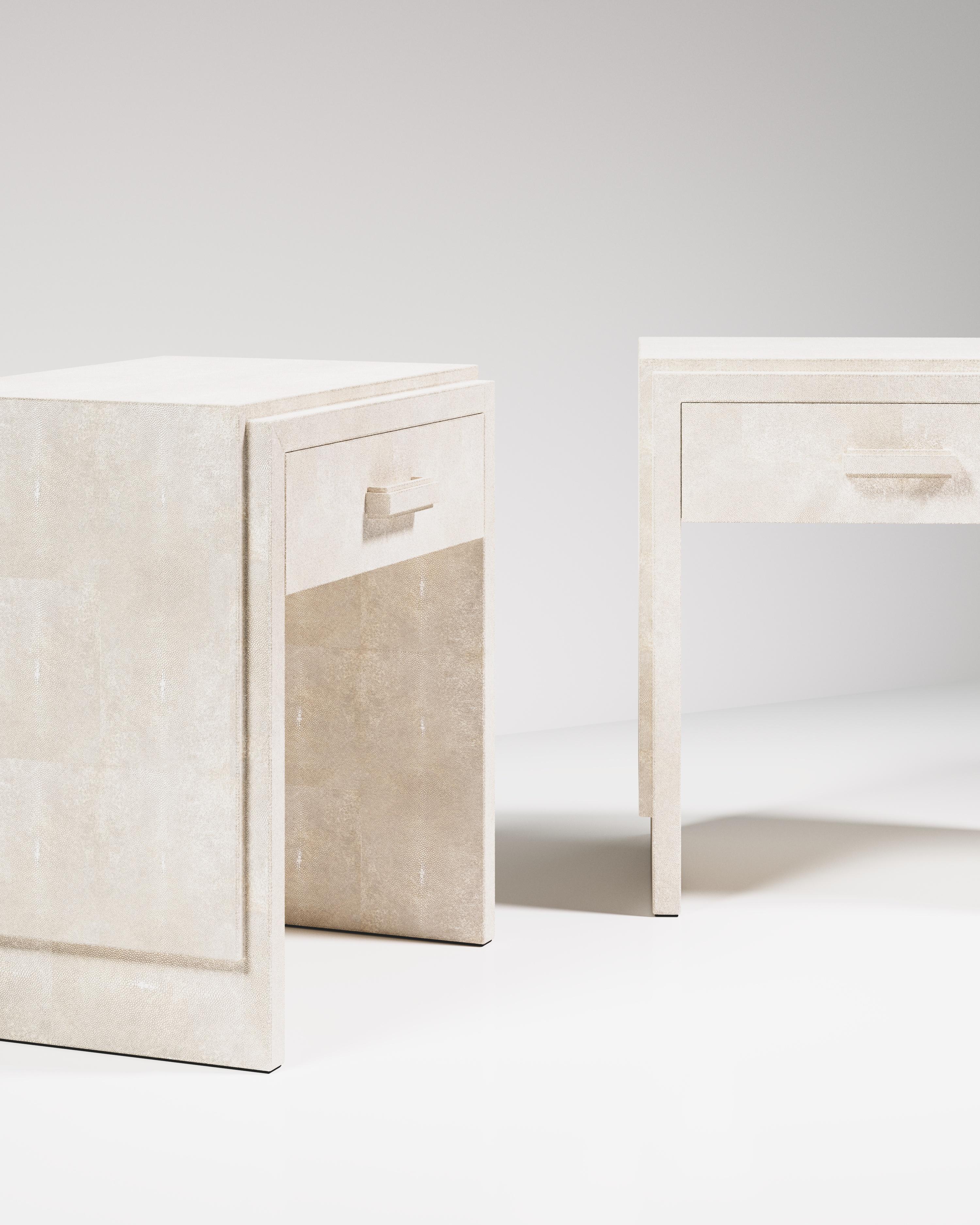 The tomboy bedside by R&Y Augousti is an elegant piece with its subtle geometry. This bedside table is completely inlaid in cream shagreen. This bedside table includes one drawer. Available in other finishes and second version, see images at end of