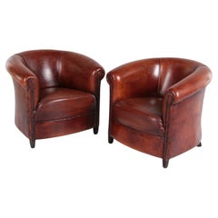 Set of Two Sheepskin Armchairs with a Beautiful Brown Patina