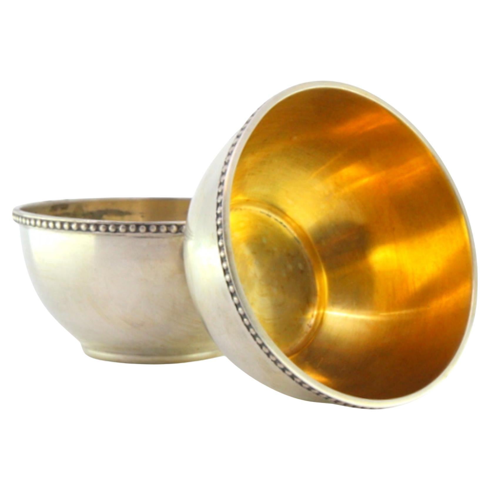 Set of two silver washbasins with pearly edges and gold interiors