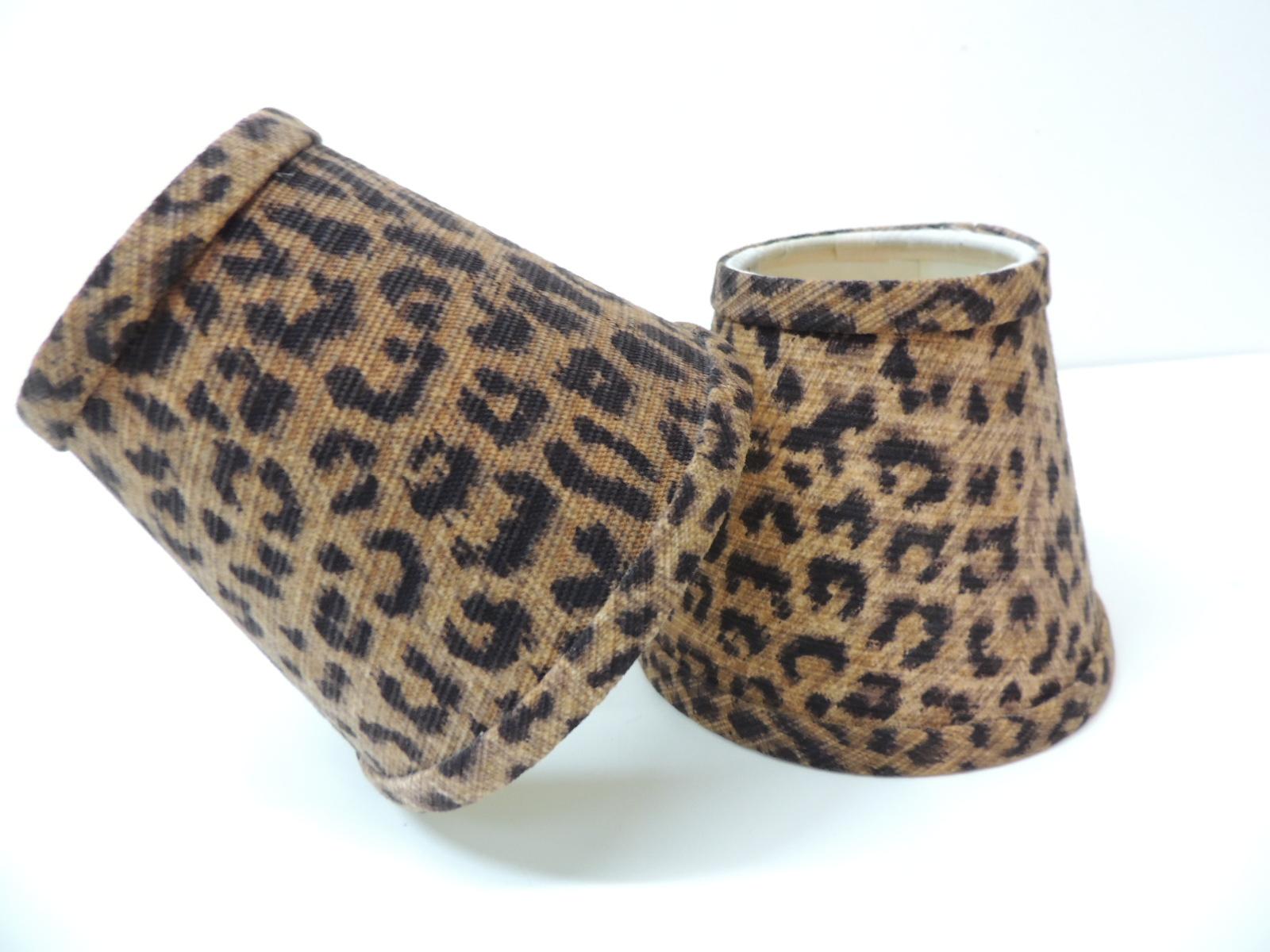 Set of tow small candelabras leopards cotton fabric woven lamp shades and self welt.
Small brass clip-on shades.
Ideal for single table lamps, sconces or chandeliers.
Size: 5” W at bottom x 4.5” H x 3” top.