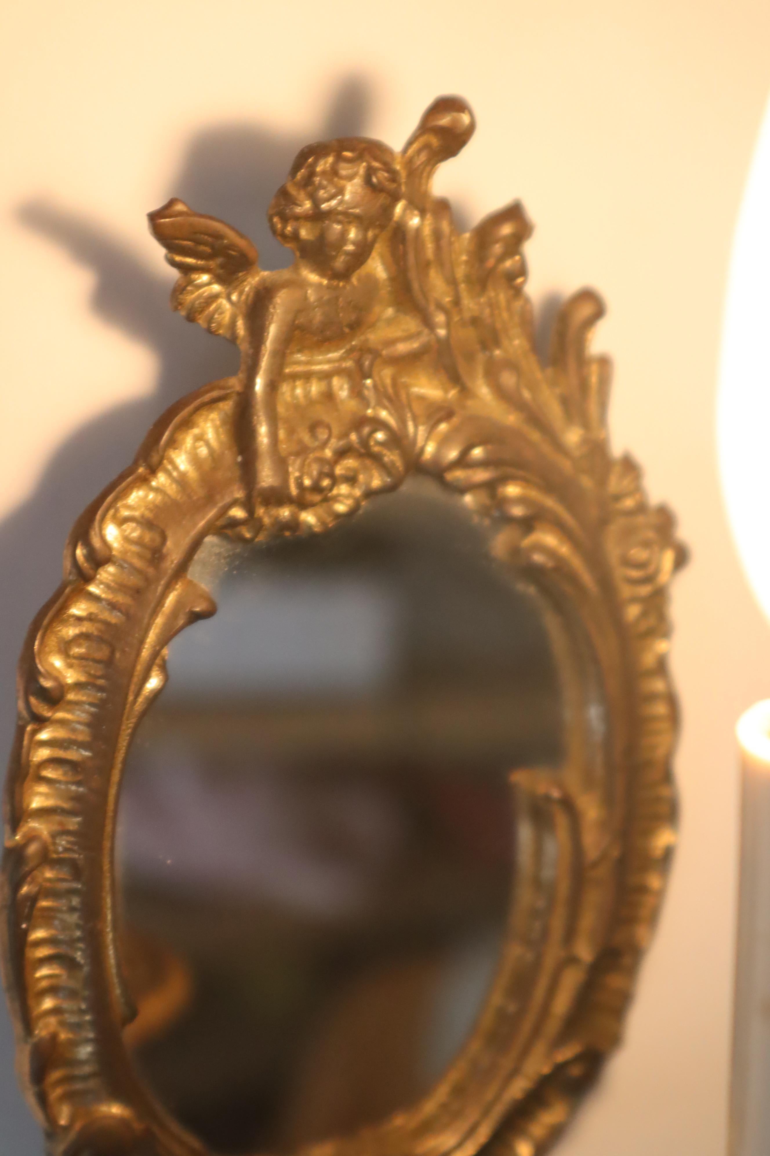 Hollywood Regency Set di due piccole lampade da parete con specchio, anni '60, Francia. in vendita