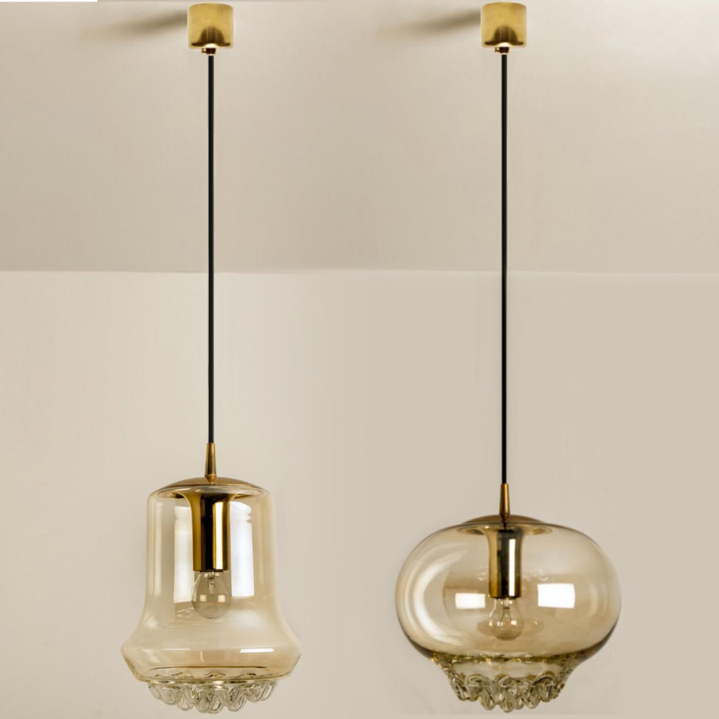 Mid-Century Modern Set of Two Smoked Brown Glass and Brass Pendant Lights by Peill and Putzler, 196 For Sale