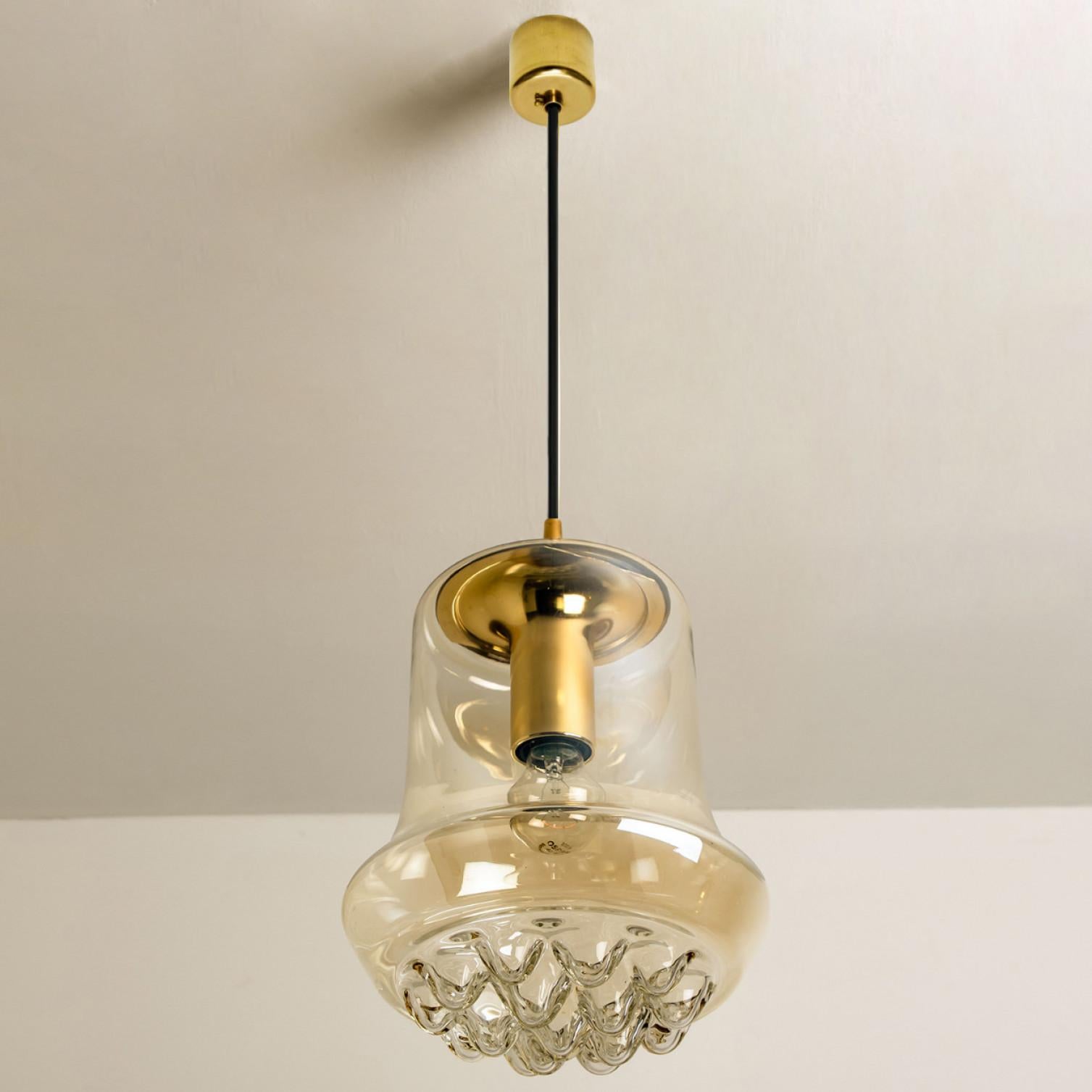 German Set of Two Smoked Brown Glass and Brass Pendant Lights by Peill and Putzler, 196 For Sale