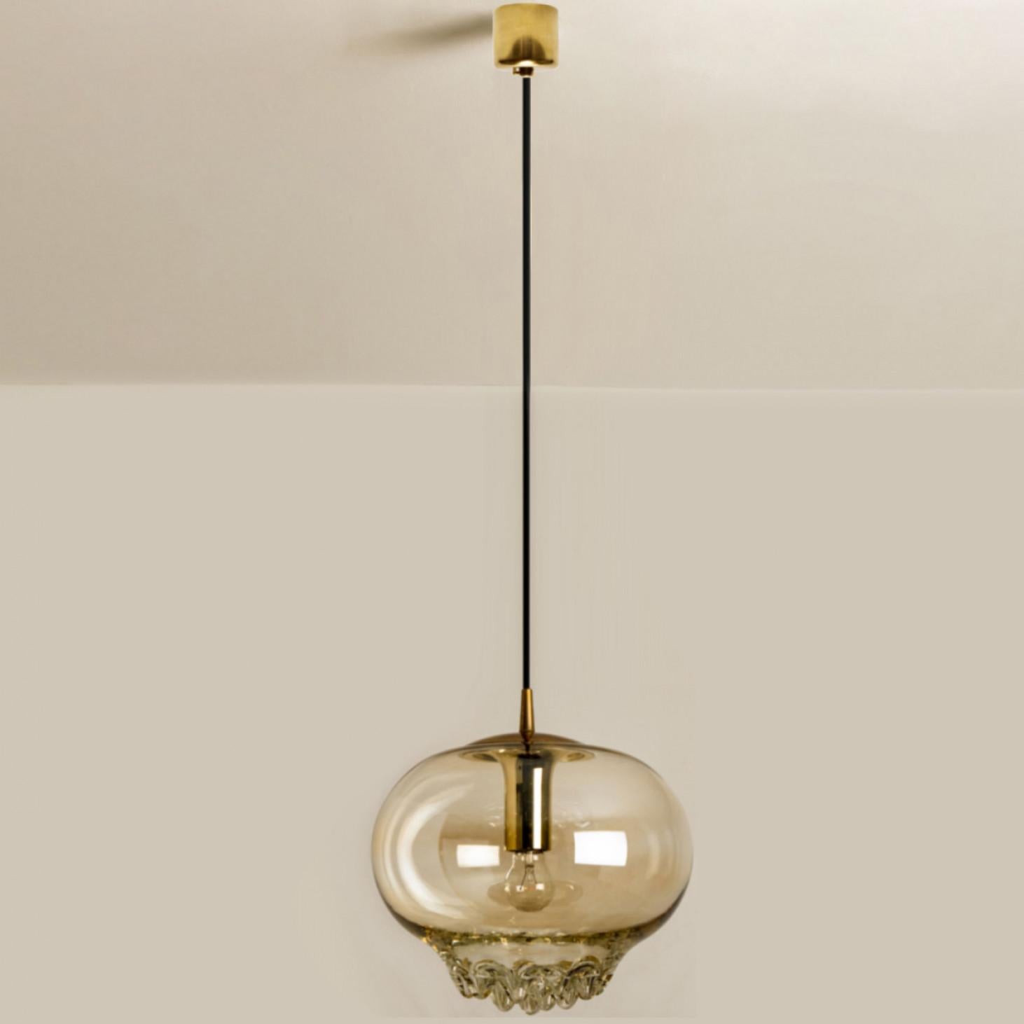 Mid-20th Century Set of Two Smoked Brown Glass and Brass Pendant Lights by Peill and Putzler, 196 For Sale