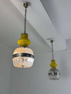 Set of two Space Age Pendant Lamps in yellow and worked Murano Glass, 1970s