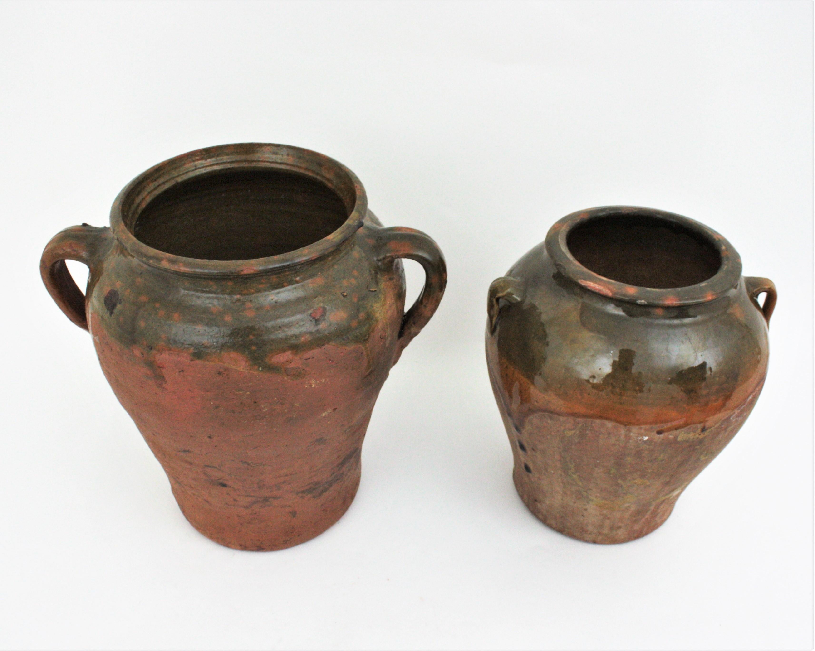 Ceramic Two Spanish Terracotta Olive Jars or Vessels For Sale
