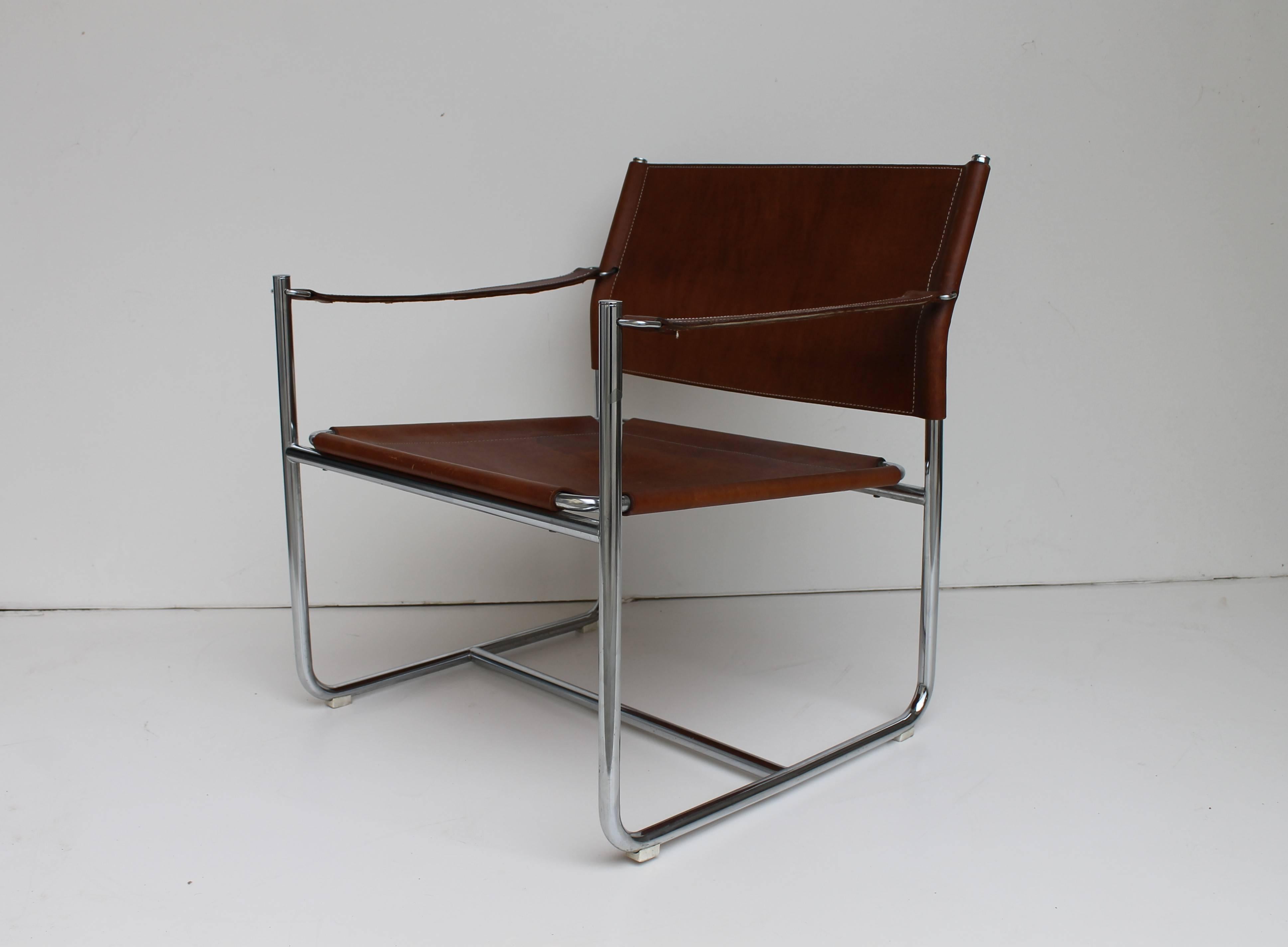 Set of two steel and brown leather easy chair 