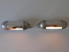 Set of Two Streamline Design Sub-Marine Cabinet Sconces by König Germany 1940s