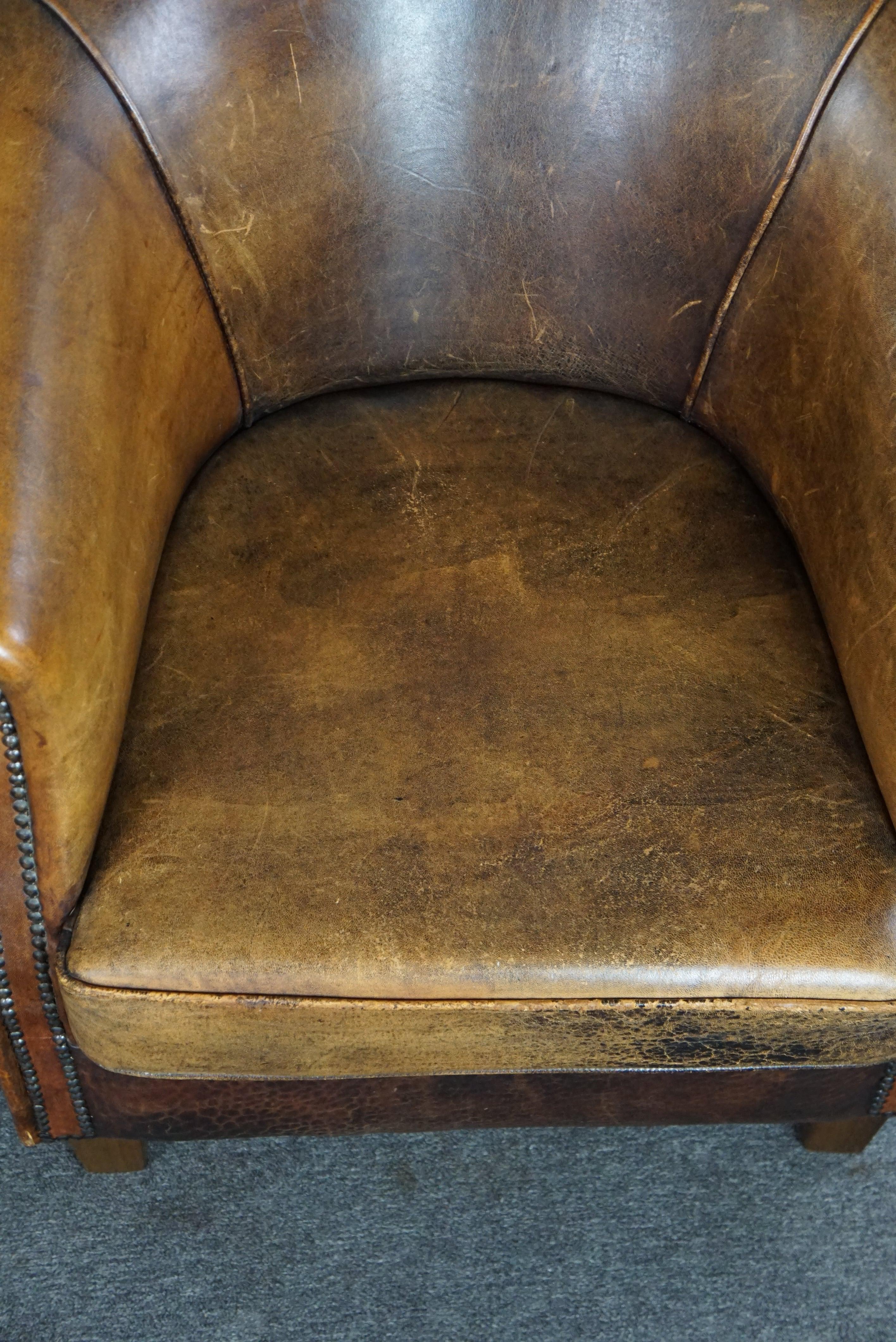 Leather Set of two sturdy sheep leather club chairs, beautiful dark cognac color