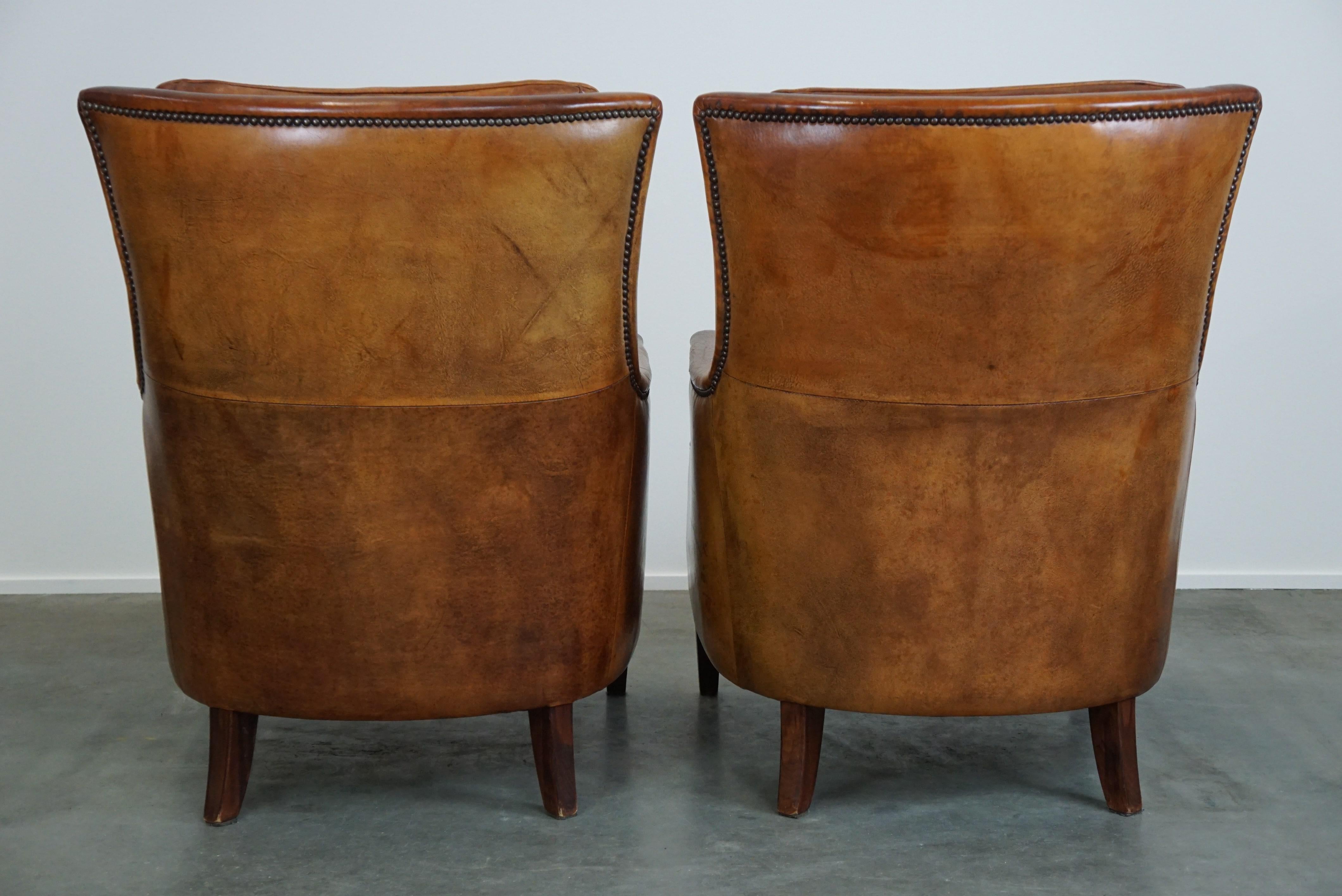 Hand-Crafted Set of two super rugged and very comfortable sheep leather armchairs. For Sale