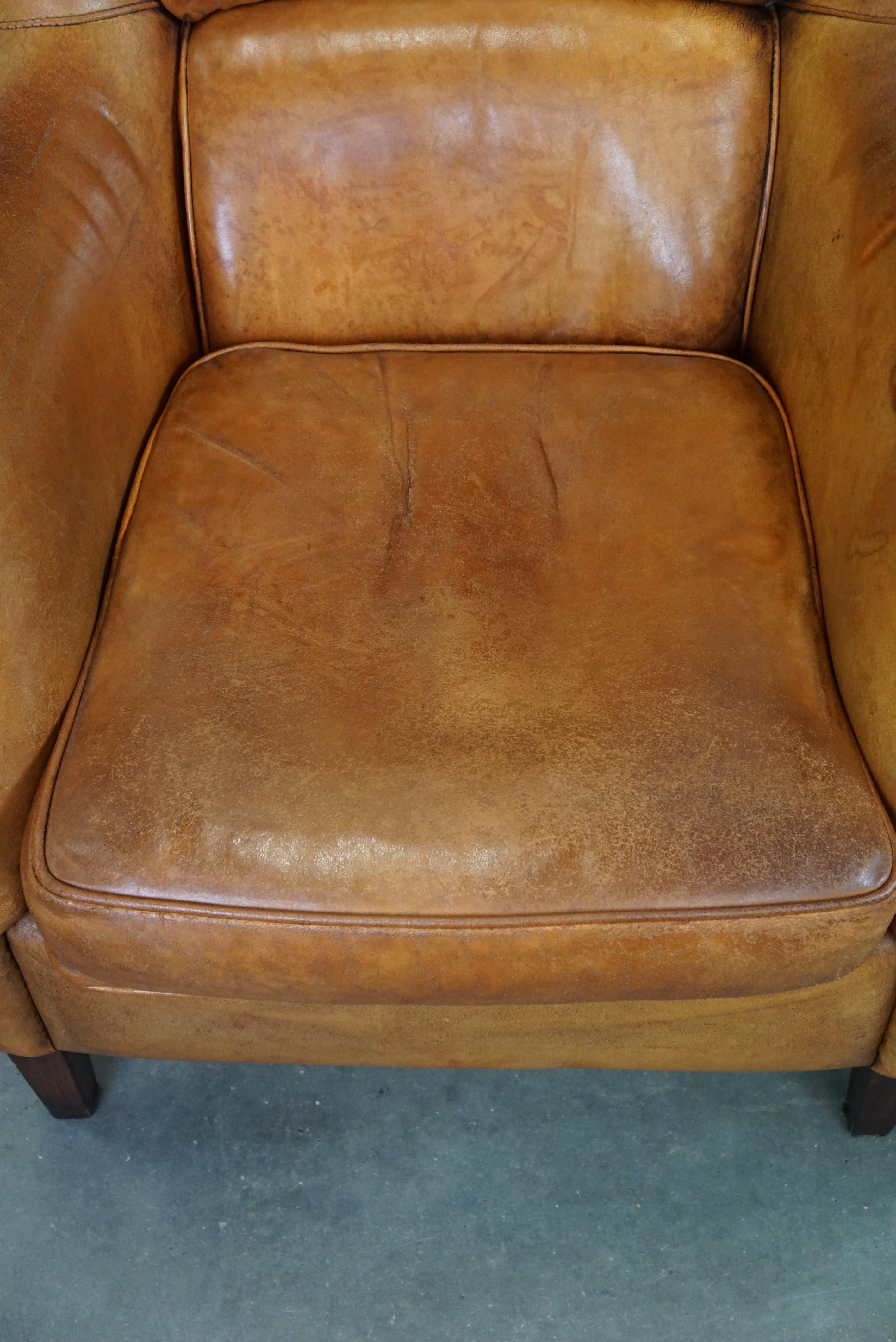 Contemporary Set of two super rugged and very comfortable sheep leather armchairs. For Sale