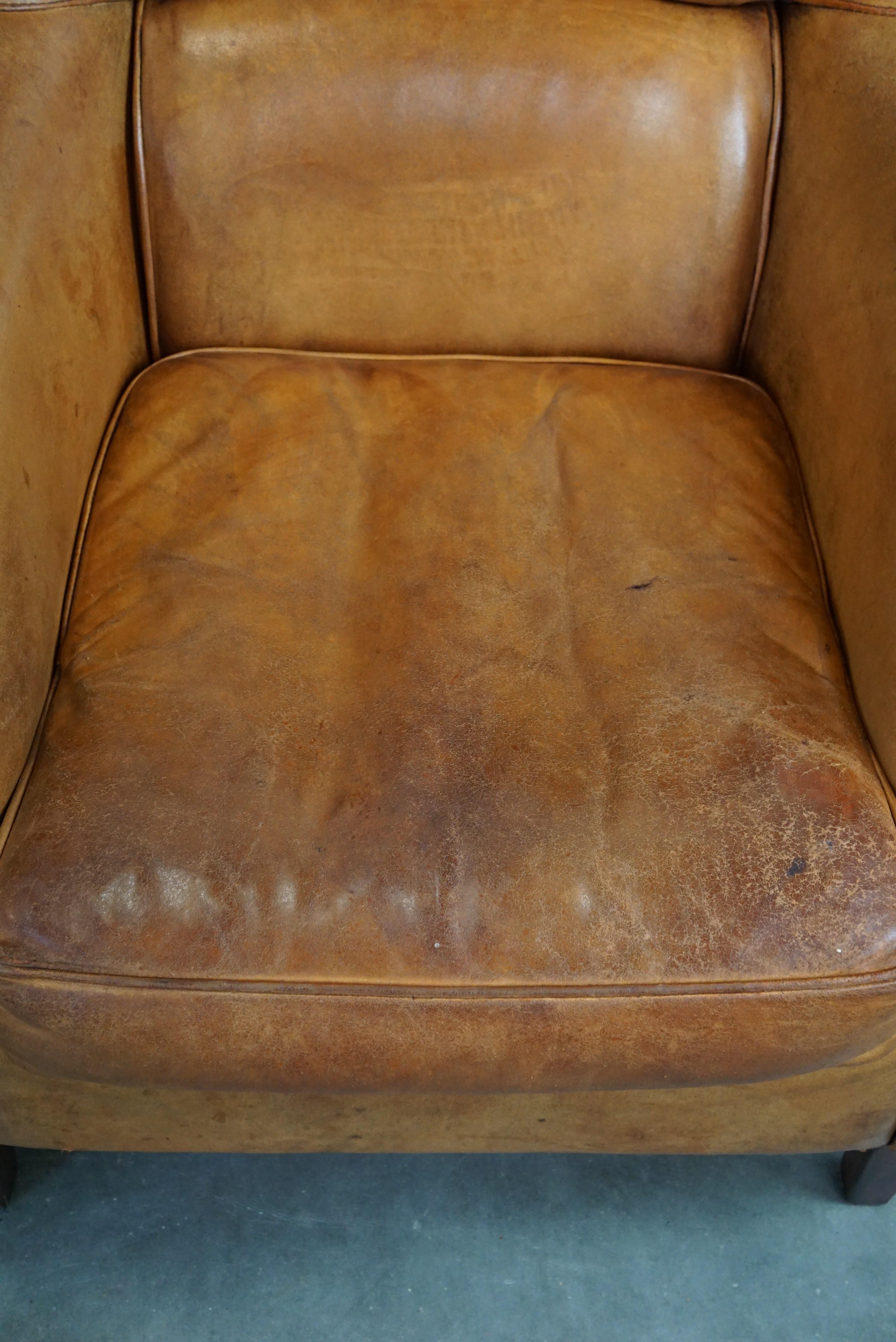 Leather Set of two super rugged and very comfortable sheep leather armchairs. For Sale