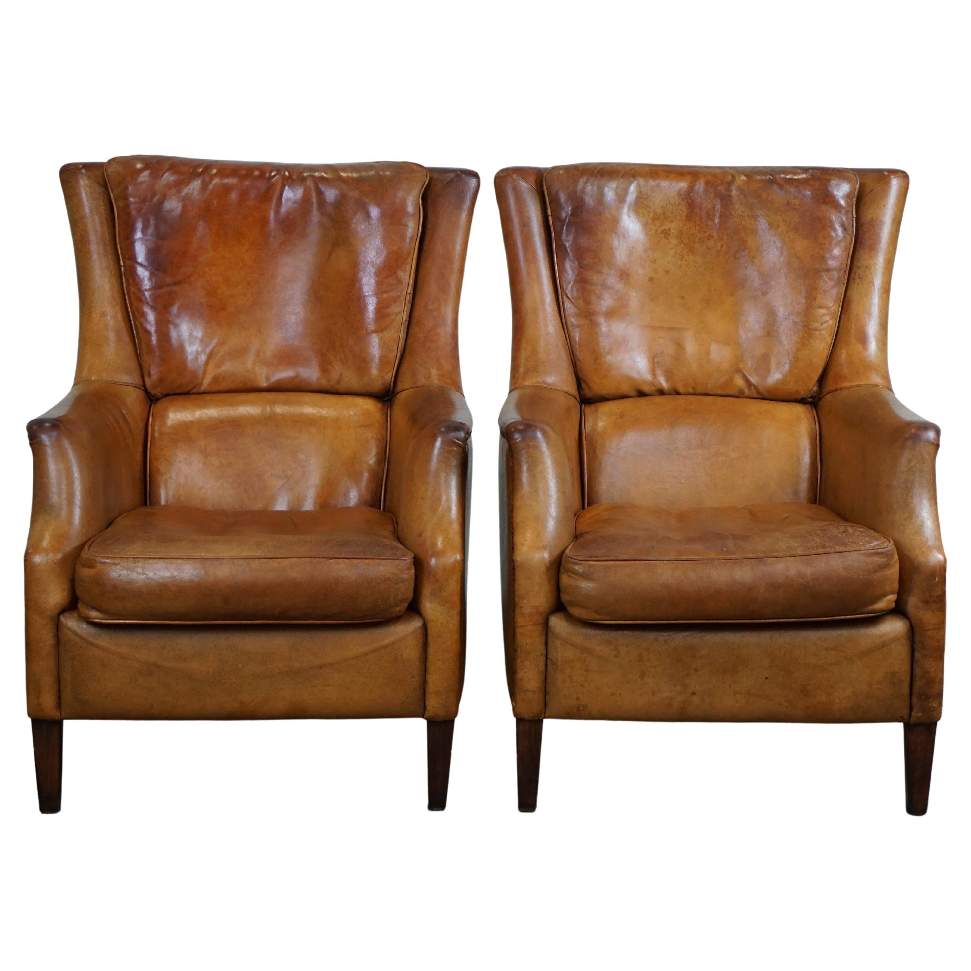 Set of two super rugged and very comfortable sheep leather armchairs. For Sale