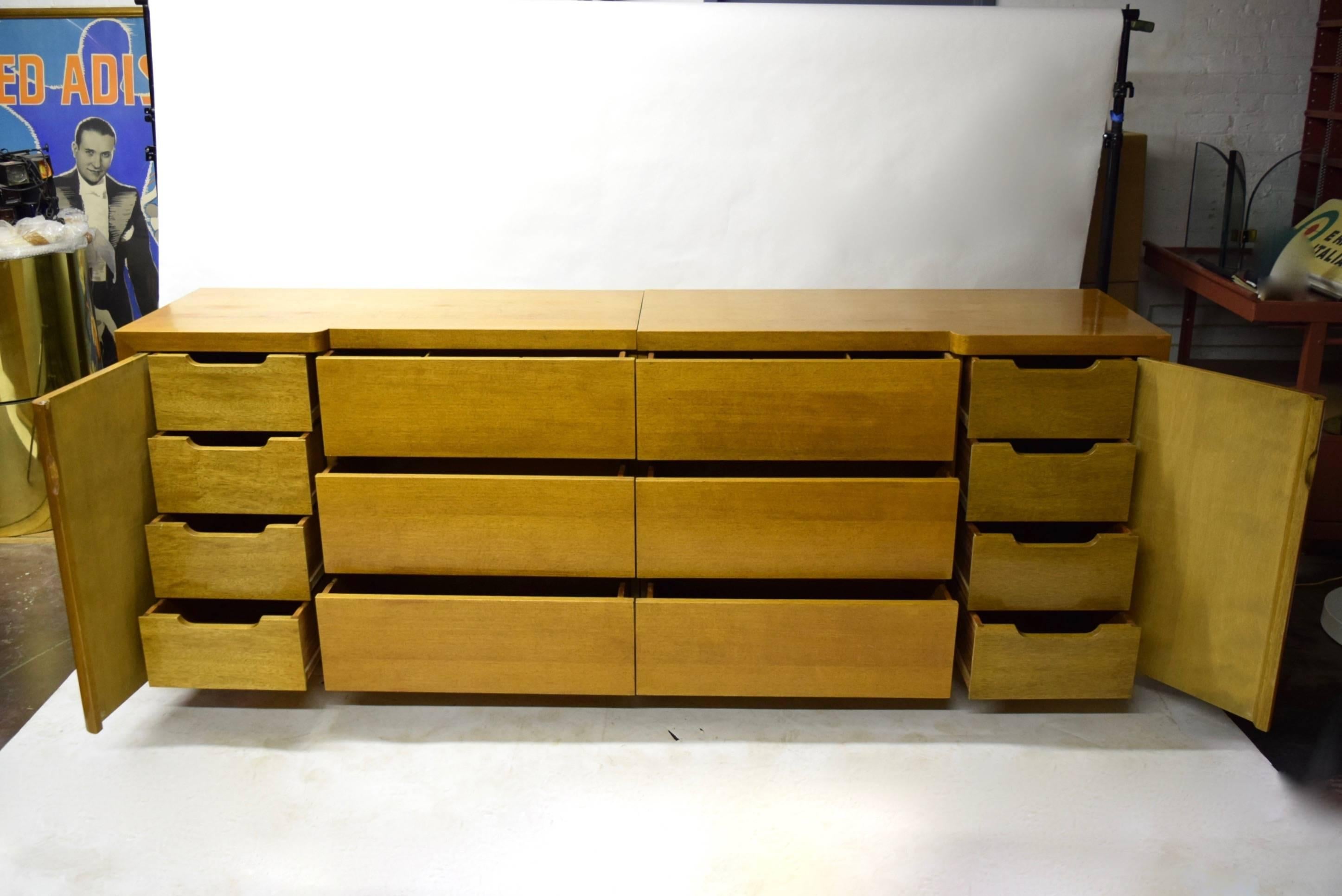 *SPRING SALE*
A refinished, vintage modern pair of dressers of very good quality in cherrywood. The chest is split in the center and finished on all sides allowing it to be used individually or placed together at either end. Each half has three