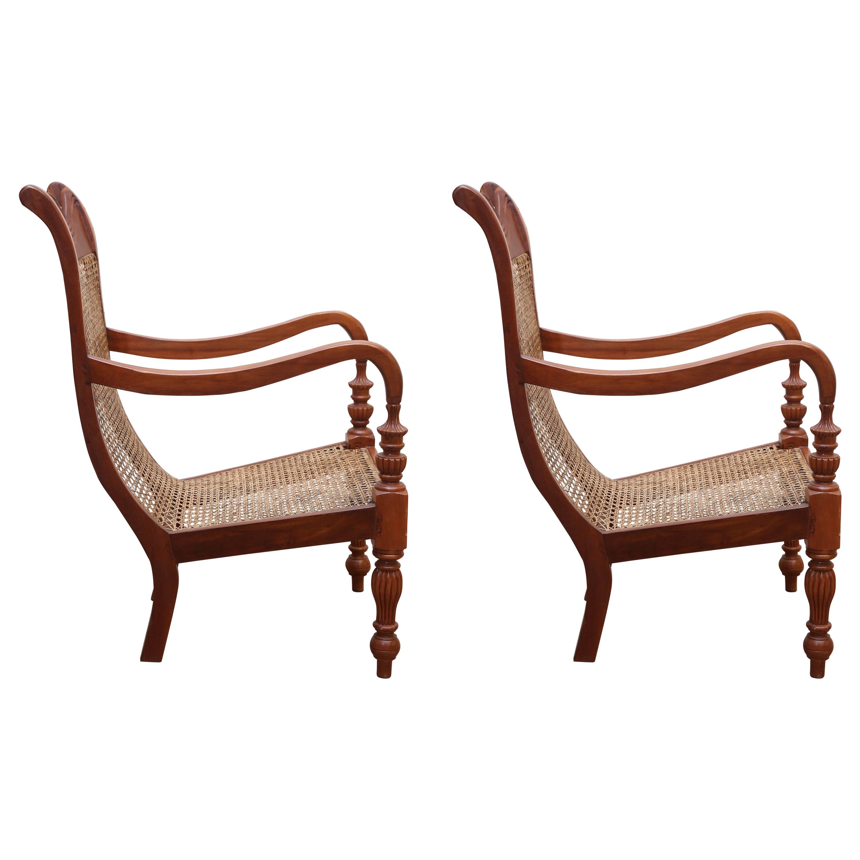 Set of Two Teak Wood and Cane Lounge Chairs from Colombo Area of Sri Lanka For Sale