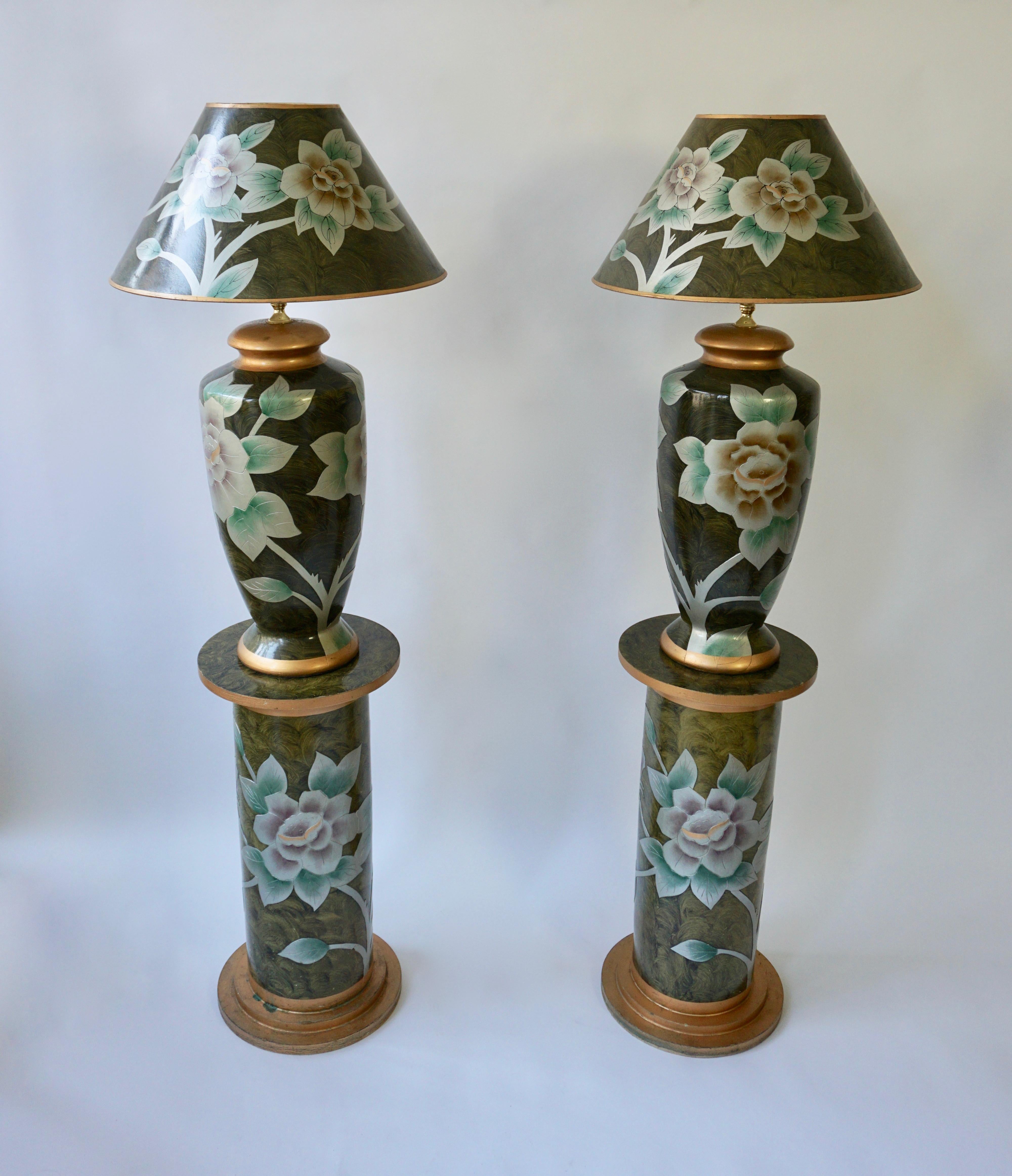 Two beautiful terracotta table lamps on two pedestals. Italy, 1970s.

Measures:
 Height table lamp 88 cm, diameter 50 cm.
Height pedestal 69 cm, diameter 33 cm.
Total height 157 cm.
One E27 bulb.