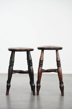 Set of two timeless antique English Windsor stools from the 18th century