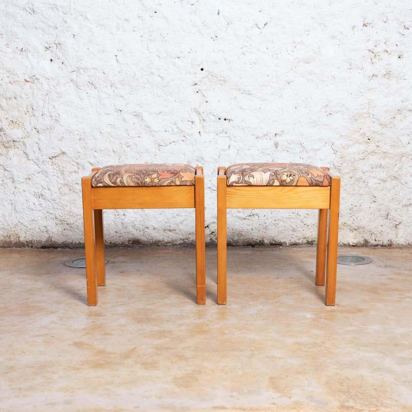 Set of two pine wood stools designed by Unknown Spanish designer, circa 1960
Made by unknown manufacturer, circa 1960

Pine wood and original upholstery fabric

In good original condition, preserving a beautiful patina, with minor wear consistent