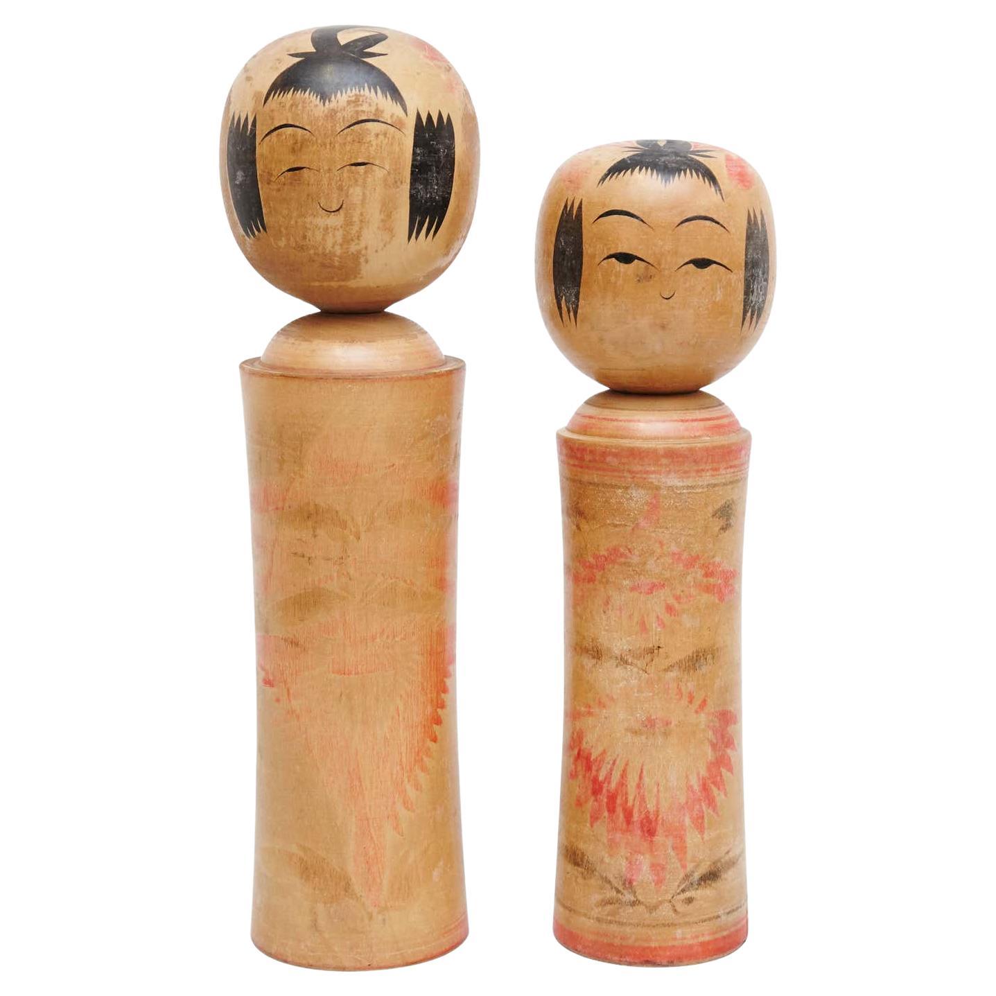 Ensemble de deux poupées traditionnelles japonaises Kokeshi, vers 1930