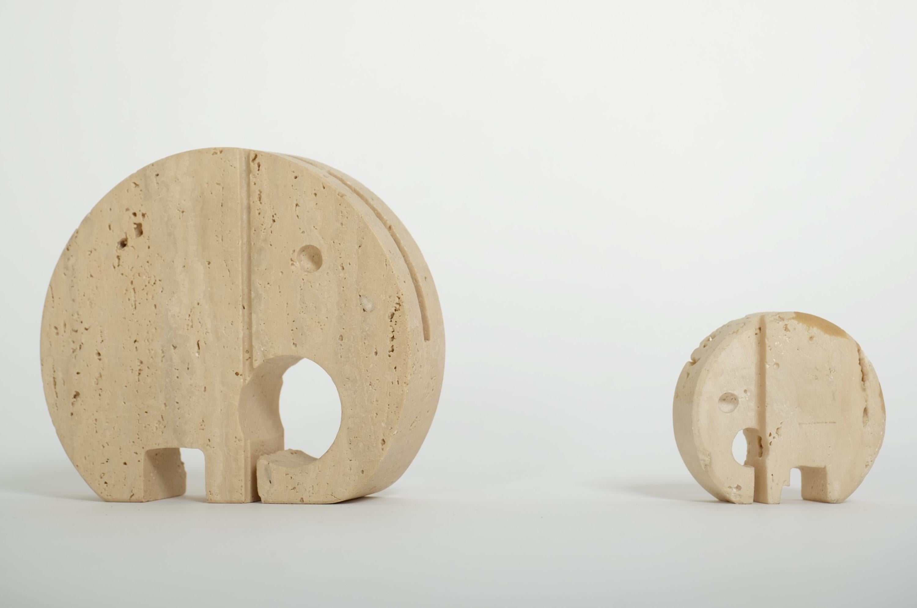 Set of two travertine elephant sculptures as desk organizers by Fratelli Mannelli, Italy, 1970s.

A beautiful elephant-shaped letter holder and paperweight. Good condition, undamaged. The small elephant was likely repaired during