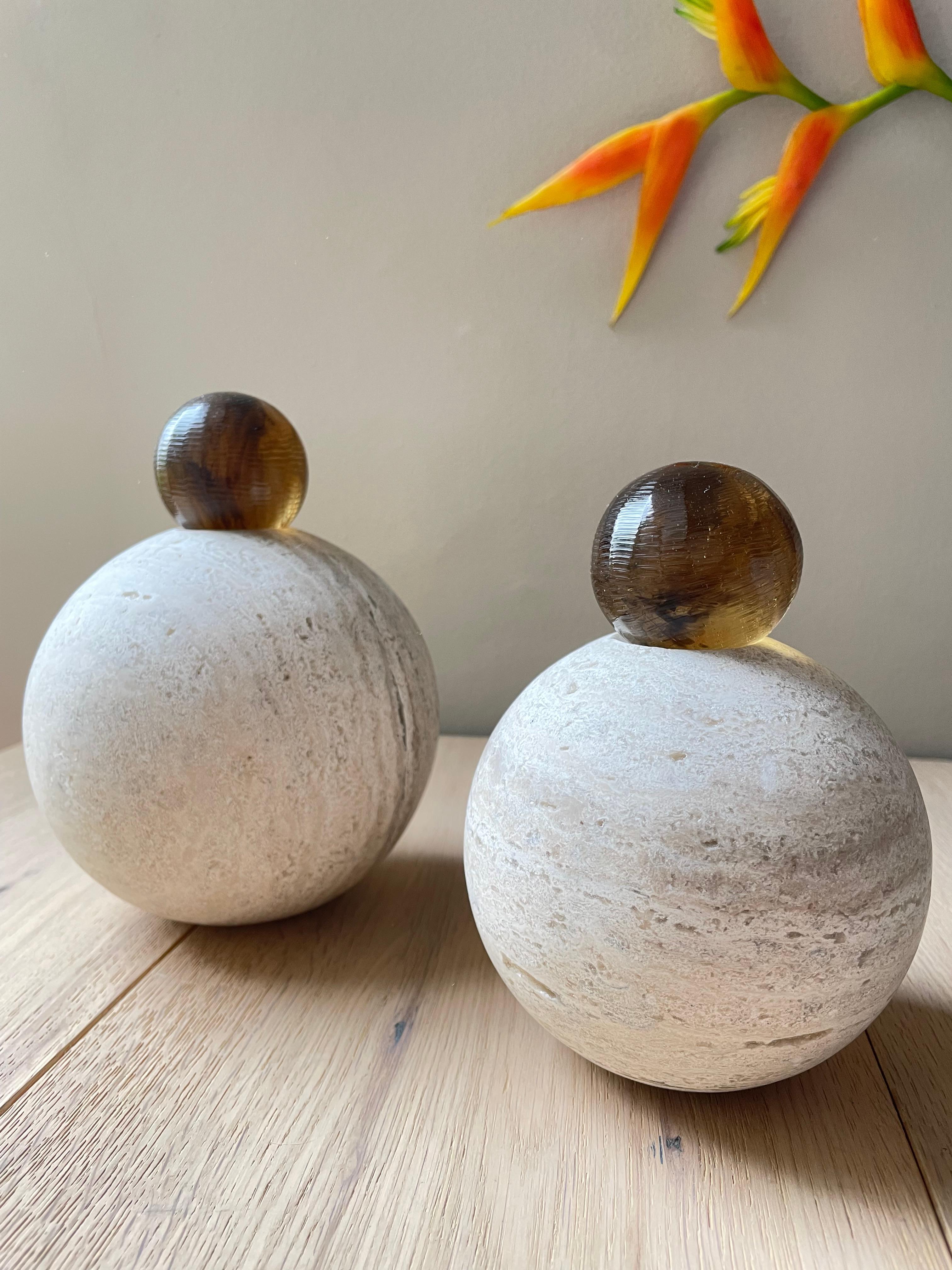 Our stack sphere sculptures can be used as a decorative element on a coffee table, bookshelf, console etc. Their warm hue and curved lines add the right amount of visual interest without overwhelming additional decor. The mix of marble and resin