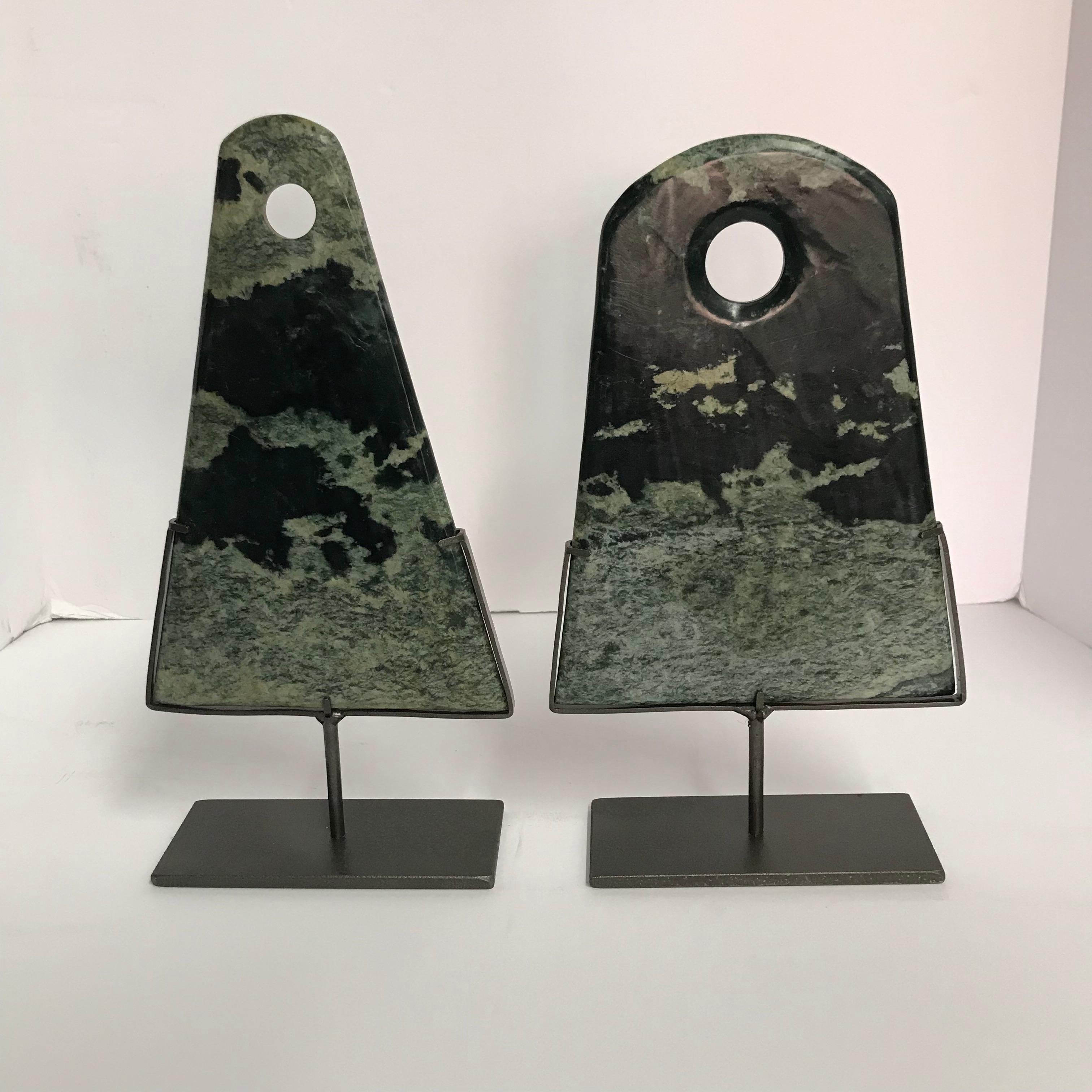 Contemporary Chinese set of two triangle shaped stone discs on metal stands
Dark and light green in coloration.
One disc measures 6.5